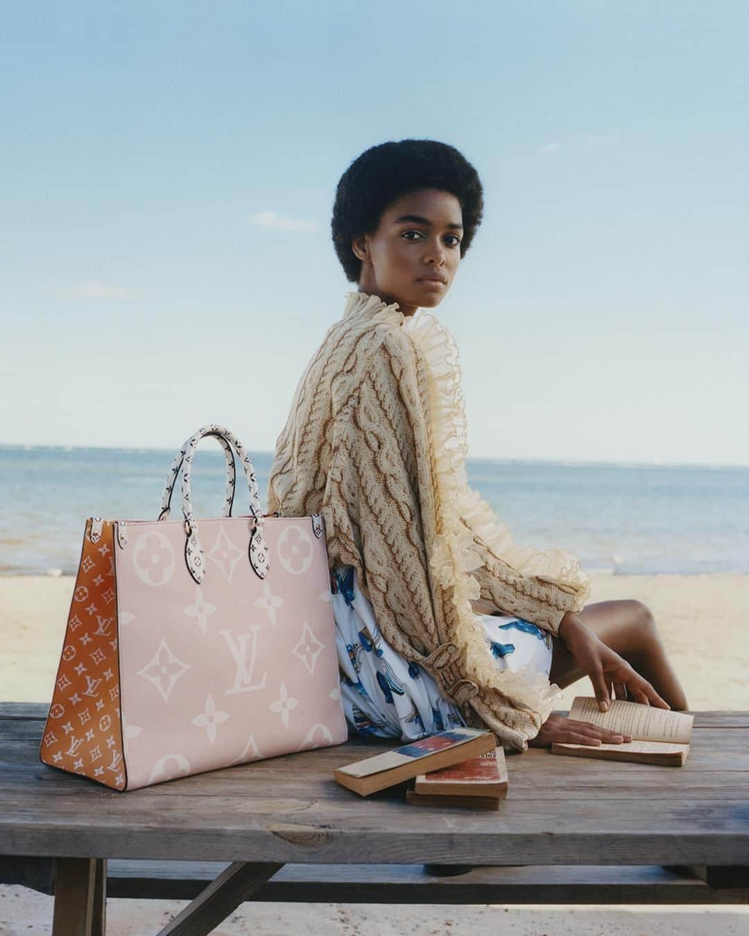 のインスタグラム：「Sun-kissed style. The #LouisVuitton Summer Collection splashes the new Monogram Giant pattern across a range of new and iconic bags and accessories. See the full capsule via link in bio. Photographed by @stef_mitchell」