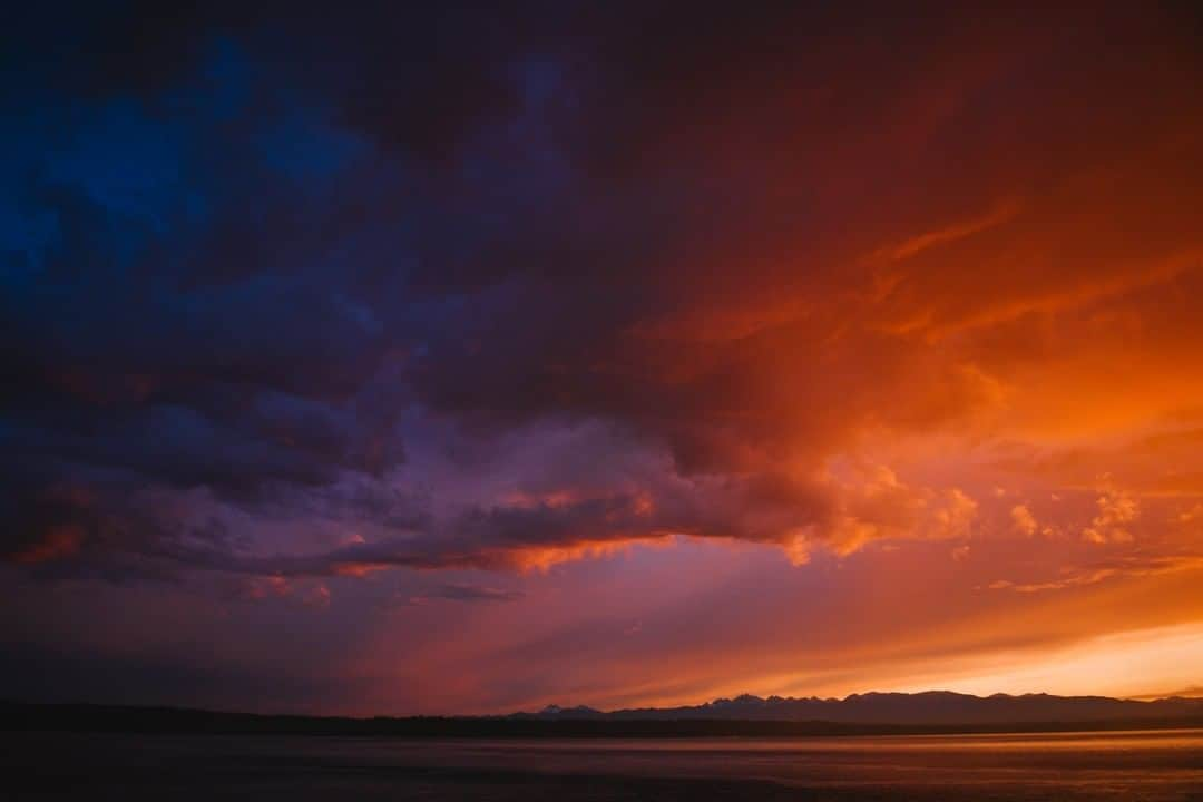 National Geographic Travelさんのインスタグラム写真 - (National Geographic TravelInstagram)「Photo by @max.lowe | As we steamed north out of the Puget Sound and into the calm waters of the inside passage from Washington to Alaska, the sky turned to fire and ice in one of the most shockingly magnificent sunsets I had ever seen. To see more from his trip up the inside passage follow @max.lowe」4月4日 22時04分 - natgeotravel