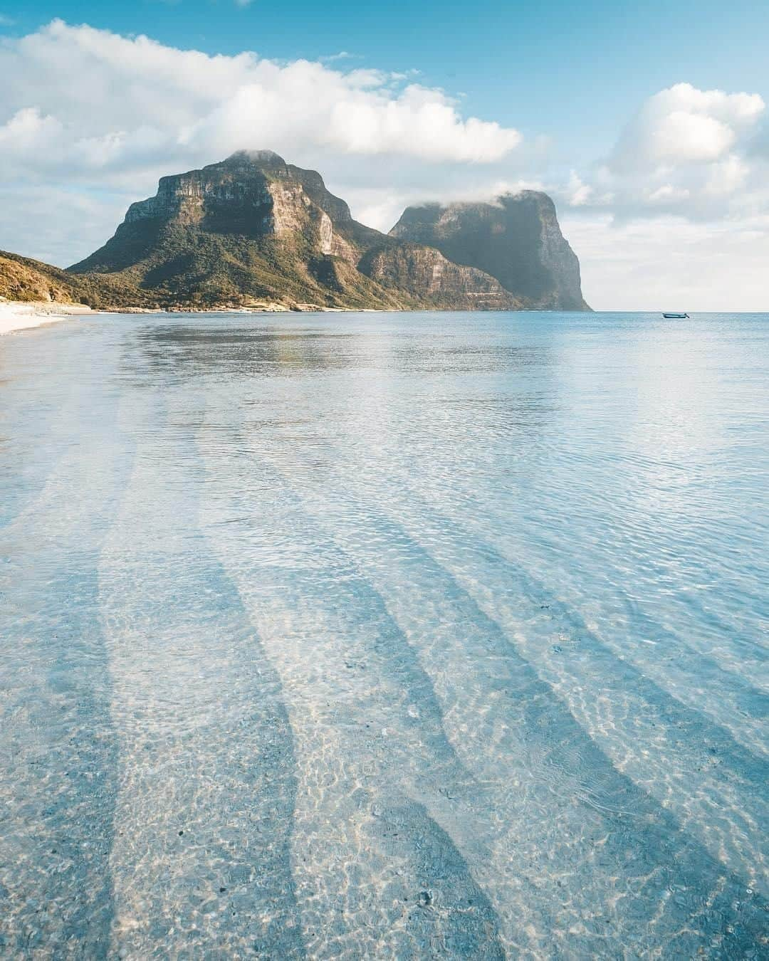 Australiaさんのインスタグラム写真 - (AustraliaInstagram)「Meditation station 🧘🏻 @jamesvodicka found the perfect spot to stop and take it all in at #LordHoweIsland, located just off the coast of @visitnsw. It may be relatively small in size, only 11km long and 2km wide, but beautiful @lordhoweislandtourism is home to a plethora of activities, and you can choose to do loads - or simply relax and soak up the island atmosphere. There are strenuous walks up the towering peaks of #MtGower and #MtLidgbird, which we suggest following with a lazy day kicking back by the sparkling sea. With over 15 beaches dotted around the island’s coastline, we challenge you to visit them all! 🏖 #seeaustralia #newsouthwales #naturephotography #thegreatoutdoors #travel」4月5日 14時00分 - australia