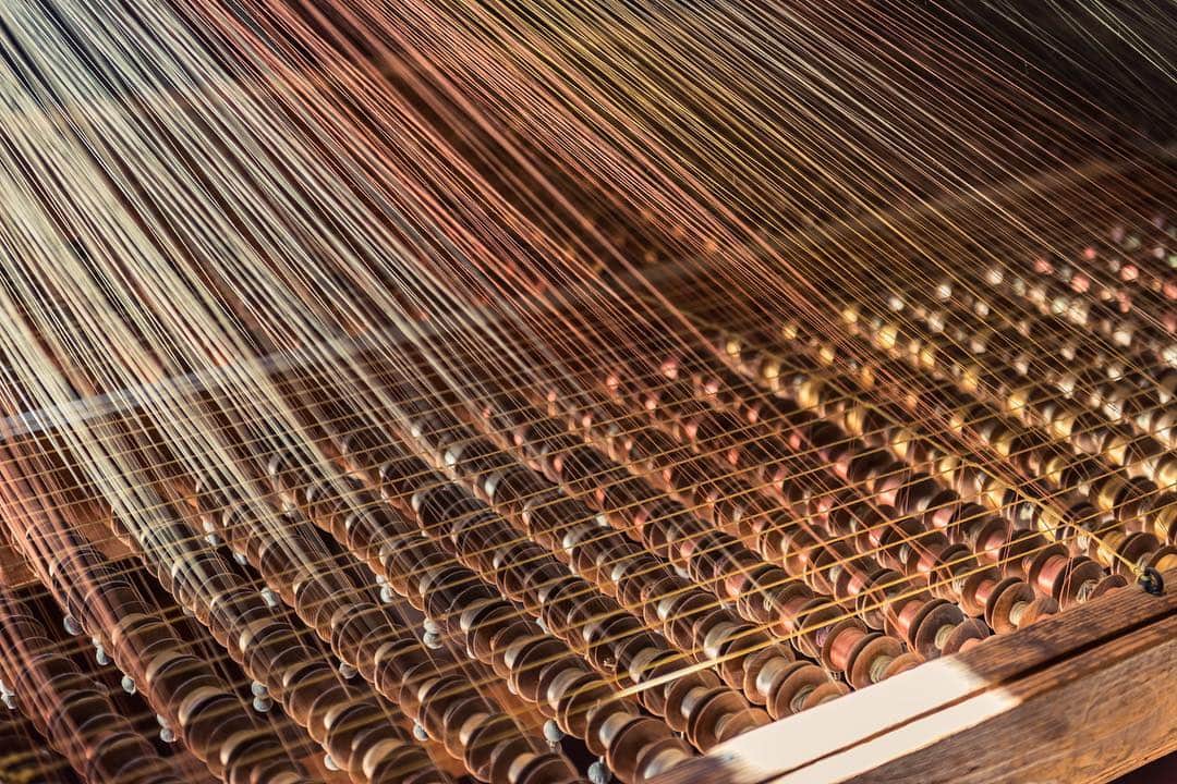 のインスタグラム：「Fabrics coming to life on the ancient Rubelli looms in their atelier in Venice. #ArmaniCasa #SaloneDelMobile #MilanDesignWeek」