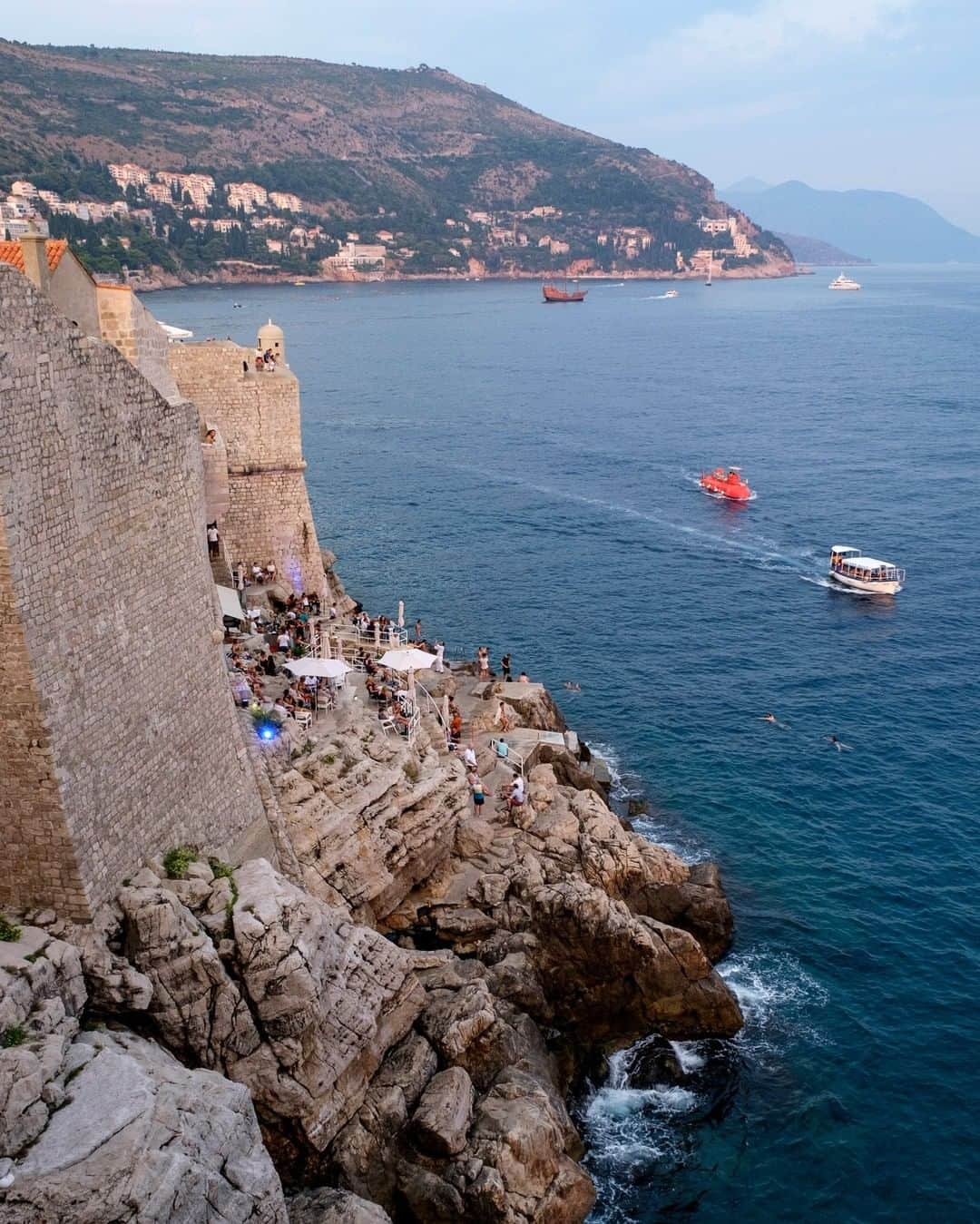 National Geographic Travelさんのインスタグラム写真 - (National Geographic TravelInstagram)「Photo by @KristaRossow | A walk along the city walls of Dubrovnik is best timed at sunset when the sun slips into the Adriatic Sea and casts soft light onto the massive stone walls. Another enticing option for sunset viewing is to find the "hole-in-the-wall" to get to one of the city's famous cliff bars. For more images from around the world follow me @KristaRossow. #Croatia #Dubrovnik」4月6日 13時01分 - natgeotravel