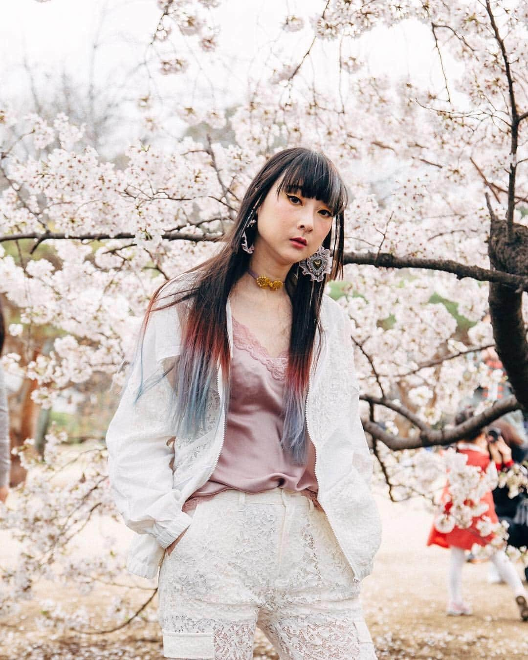 RinRinさんのインスタグラム写真 - (RinRinInstagram)「All white lace sporty outfit courtesy of @emilymalan ~ we killed two birds with one stone by doing hanami (sakura viewing) and test shooting together... but didn’t anticipate HOW COLD it would be 😂😂😂 but all in all a great day hanging out and catching up. 全身レースのスポーティ系コーデ🌸 友達と花見しながら撮影してて楽しかったけど、めっちゃ寒かったよぉーーー🙃🙃🙃 (📸 @emilymalan | except the tree, I was trying out my own camera skills😬🌸) . . Camisole: #intissimi  Lace Jacket: #xgirl Lace pants: #xgirljp  Shoes: #jennyfax Earrings: #jubileejubilee  Choker: #milhae Barrette: #mocatokyo . . #rinrindoll #rinrinootd #emilymalan #rinrinsakura #sakura #さくら #新宿御苑 #桜 #shinjukugyoen #japanesefashion #tokyofashion #harajukufashion #rinrinmodel #rinrinjapan #rinrintokyo」4月6日 17時26分 - rinrindoll