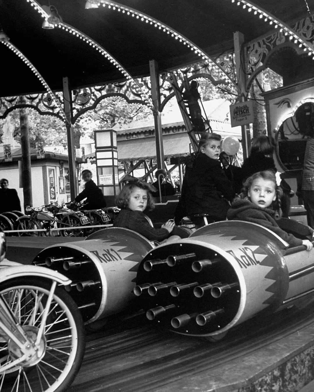 lifeさんのインスタグラム写真 - (lifeInstagram)「From the December 4, 1950 cover story: "WEST BERLIN: A Gay and Courageous City." This image ran in the story with the following caption: "West Berlin children wait expectantly for a "Rocket Ride" on the carousel." (Nina Leen—The LIFE Picture Collection/Getty Images) #Berlin #Germany」4月6日 23時15分 - life