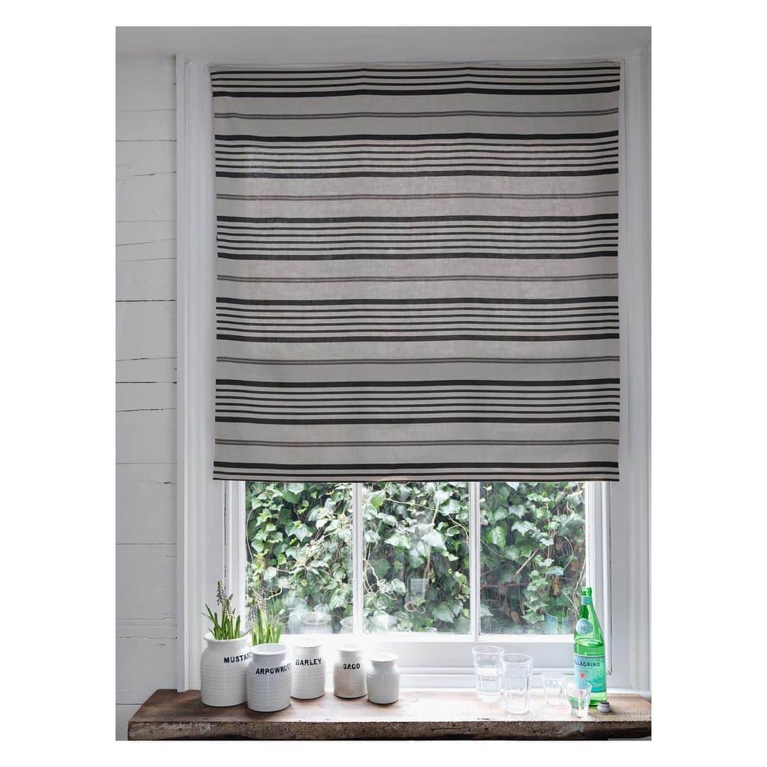キャベジズ&ローゼズのインスタグラム：「Printed in England on 100% Natural Linen, the Jolly Stripe Natural Black is the perfect foil to the Natural Hatley Black Wallpaper for a gorgeous monotone aesthetic 🖤She is made to order and works wonderfully as curtains, lampshades, fabric covers and more #linen #interiors #interiorspaces #homedesign #fabric #printedinengland #britishmade #printedtoorder #cabbagesandroses  #cabbagesandroseslifestyle @christina_strutt @cabbagesandroses_shop」