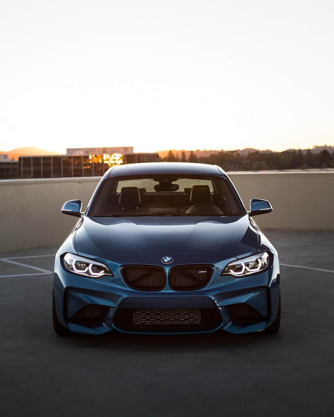 BMWさんのインスタグラム写真 - (BMWInstagram)「A seductive look. The BMW M2 Coupé. #BMWrepost @ProdigyM2 #BMWM #BMW #M2 __ BMW M2 Coupé: Fuel consumption in l/100 km (combined): 8.5. CO2 emissions in g/km (combined): 199. The values of fuel consumptions, CO2 emissions and energy consumptions shown were determined according to the European Regulation (EC) 715/2007 in the version applicable at the time of type approval. The figures refer to a vehicle with basic configuration in Germany and the range shown considers optional equipment and the different size of wheels and tires available on the selected model. The values of the vehicles are already based on the new WLTP regulation and are translated back into NEDC-equivalent values in order to ensure the comparison between the vehicles. [With respect to these vehicles, for vehicle related taxes or other duties based (at least inter alia) on CO2-emissions the CO2 values may differ to the values stated here.] The values of the vehicles are preliminary. The CO2 efficiency specifications are determined according to Directive 1999/94/EC and the European Regulation in its current version applicable. The values shown are based on the fuel consumption, CO2 values and energy consumptions according to the NEDC cycle for the classification. For further information about the official fuel consumption and the specific CO2 emission of new passenger cars can be taken out of the „handbook of fuel consumption, the CO2 emission and power consumption of new passenger cars“, which is available at all selling points and at https://www.dat.de/angebote/verlagsprodukte/leitfaden-kraftstoffverbrauch.html.」4月8日 5時00分 - bmw