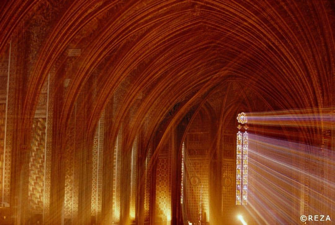 thephotosocietyさんのインスタグラム写真 - (thephotosocietyInstagram)「Photo by @rezaphotography #France, Cathedral of Albi  Spirituality.  Over the course of my wanderings through the south of France, I roamed from village to village in search of an authentic, rural France. Memories of my first photographic forays in Iran, when I was barely more than an adolescent, rose to the surface. Almost three decades later, the time had passed, leaving the lasting impression over the course of this long reportage that it had been a gift. I opened the doors to the magnificent cathedral of Albi. I climbed a hidden stairway to gain some height and get as close as possible to the lancet arches of this treasure of Gothic art. The weather was gloomy and the cathedral was plunged in the obscurity which gave me precious little opportunity to reveal its beauty.  A ray of light pierced the clouds. Without a flash, I did not alter the ambience, nor did I attract the attention of the crowds. For an instant, the divine light filled the space. A pause, a heartbeat... I reflected that the houses of God, whatever religion they belonged to, are places where all can encounter a certain peaceful spirituality.  Published in "War + Peace" (National Geographic Publishing, 2007), "Reza, entre guerre et paix" (National Geographic Publishing, 2008) and "Derrière l'objectif" (Hoëbeke Publishing, 2010)  #albi #cathedral #france #light #spirituality #gothic #impressive #sun #divine #religion #catholicism #peaceful #photooftheday #photojournalism #reza #rezaphoto #rezadeghati #rezaphotography #rezaphotojournalist #webistan」4月7日 22時19分 - thephotosociety