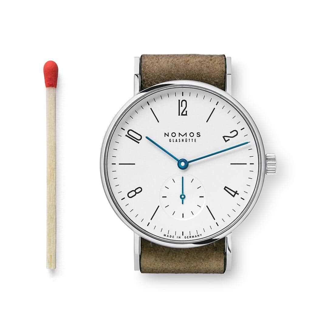 のインスタグラム：「Perfect proportions in a 33-millimeter diameter—or the length of a match: The iconic watch model Tangente is as straightforward as ever. A NOMOS classic, powered by the hand-wound movement Alpha.  #nomos #nomostangente #watch #watches #watchesofinstagram #watchfam #watchuseek #watchlove #smallwatch #watchmania #wristwatch #mechanicalwatch #clock #horology #timepiece #timepieces」