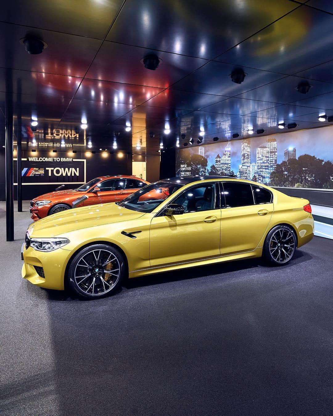 BMWさんのインスタグラム写真 - (BMWInstagram)「M Town is officially a new district in Geneva. The BMW M2 Competition and M5 Competition. #BMW #M2 #M5 #BMWM #M_Town __ BMW M2 Competition: Fuel consumption in l/100 km (combined): 9.8 - 9.0. CO2 emissions (combined) in g/km: 224 - 206.  BMW M5 Competition: Fuel consumption in l/100 km (combined): 10.8 - 10.7. CO2 emissions in g/km (combined): 246 - 243. The values of fuel consumptions, CO2 emissions and energy consumptions shown were determined according to the European Regulation (EC) 715/2007 in the version applicable at the time of type approval. The figures refer to a vehicle with basic configuration in Germany and the range shown considers optional equipment and the different size of wheels and tires available on the selected model. The values are already based on the new WLTP regulation and are translated back into NEDC-equivalent values in order to ensure the comparison between the vehicles. [With respect to these vehicles, for vehicle related taxes or other duties based (at least inter alia) on CO2-emissions the CO2 values may differ to the values stated here.] The CO2 efficiency specifications are determined according to Directive 1999/94/EC and the European Regulation in its current version applicable. The values shown are based on the fuel consumption, CO2 values and energy consumptions according to the NEDC cycle for the classification. For further information about the official fuel consumption and the specific CO2 emission of new passenger cars can be taken out of the „handbook of fuel consumption, the CO2 emission and power consumption of new passenger cars“, which is available at all selling points and at https://www.dat.de/angebote/verlagsprodukte/leitfaden-kraftstoffverbrauch.html.」3月16日 1時05分 - bmw