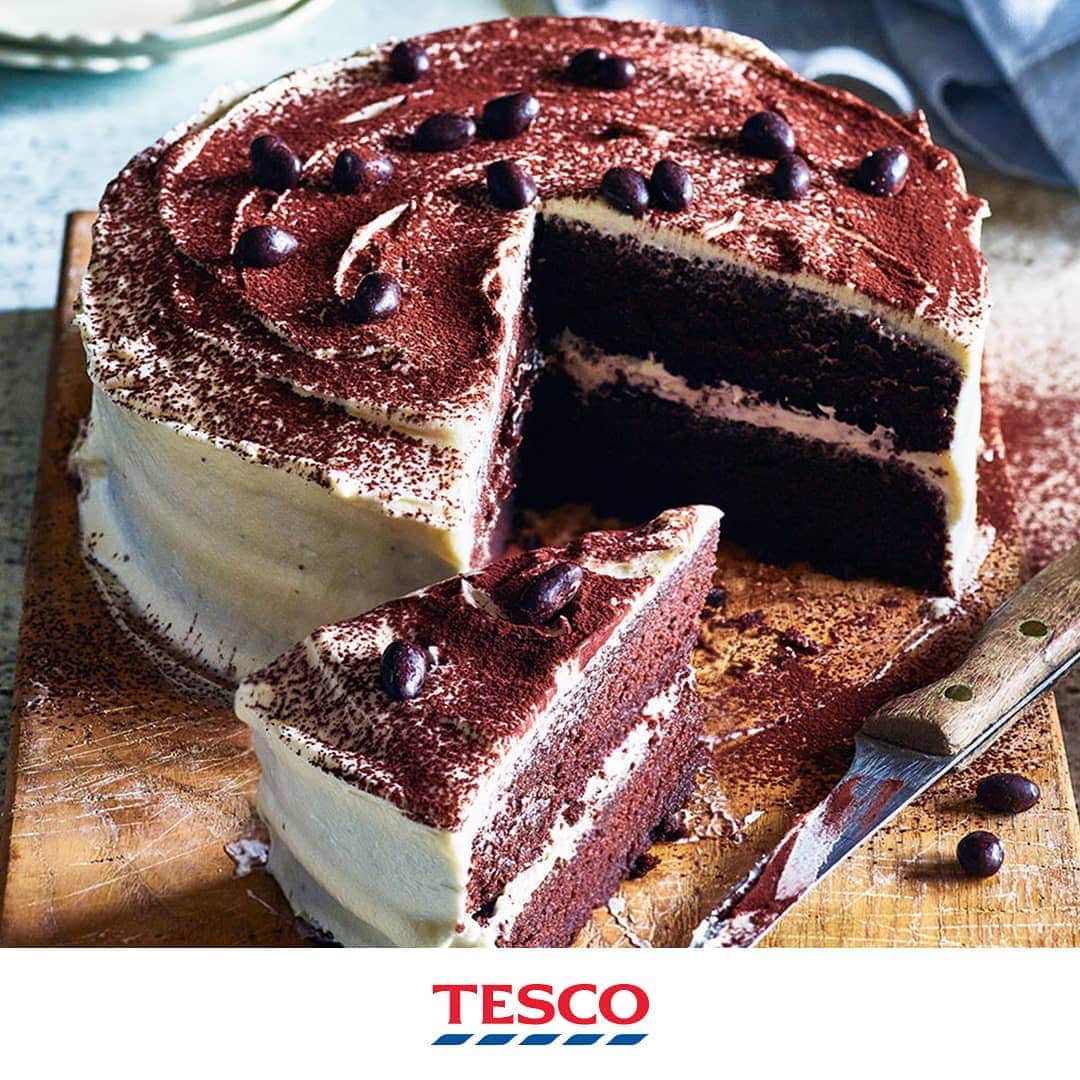 Tesco Food Officialさんのインスタグラム写真 - (Tesco Food OfficialInstagram)「Coffee anyone? This cappuccino cake bakes a rich blend of cocoa, vanilla and - not to forget - coffee into a decadent sponge, then tops it all off with a marshmallow icing. Yes please!⁣ ⁣ Ingredients⁣ 250g butter, softened⁣ 250g soft brown sugar⁣ 250g self-raising flour⁣ 50g cocoa, plus extra to decorate⁣ 4 large eggs⁣ 100g natural yogurt⁣ 100ml strong coffee, cooled⁣ 1 tsp vanilla bean paste or extract⁣ For the coffee syrup⁣ 100ml strong coffee⁣ 2 tbsp soft brown sugar⁣ For the frosting⁣ 100g butter, softened⁣ 200g icing sugar⁣ 1 x 213g tub marshmallow fluff⁣ cocoa powder, for dusting⁣ chocolate-covered coffee beans, to decorate (optional)⁣ ⁣ Method⁣ 1. Preheat the oven to gas 4, 180°C, fan 160°C. Lightly grease and line the base and sides of 2 x 20cm sandwich tins. Put the butter and sugar in a mixing bowl and beat, using an electric whisk, for 6-8 minutes, until pale and creamy. Add the flour, cocoa, eggs, yogurt, cooled coffee and vanilla, and mix for a further 2 mins, or until well combined. Divide the cake mixture between the prepared tins and bake on the middle shelf for 25-30 mins, until springy to the touch and lightly golden.⁣ 2. Make the coffee syrup. Heat the coffee and sugar in a small pan, until the sugar has dissolved. Remove the warm sponges from their tins to a wire rack and drizzle over the coffee syrup. Leave to cool completely.⁣ 3. For the frosting, beat together the butter and sugar in a mixing bowl until smooth. Gradually add the marshmallow fluff in large spoonfuls, mixing until well incorporated.⁣ 4. Sandwich the sponges together using roughly half of the frosting. Spread the remaining frosting over the top and sides of the cake with a palette knife. Dust with cocoa powder.」3月16日 19時16分 - tescofood