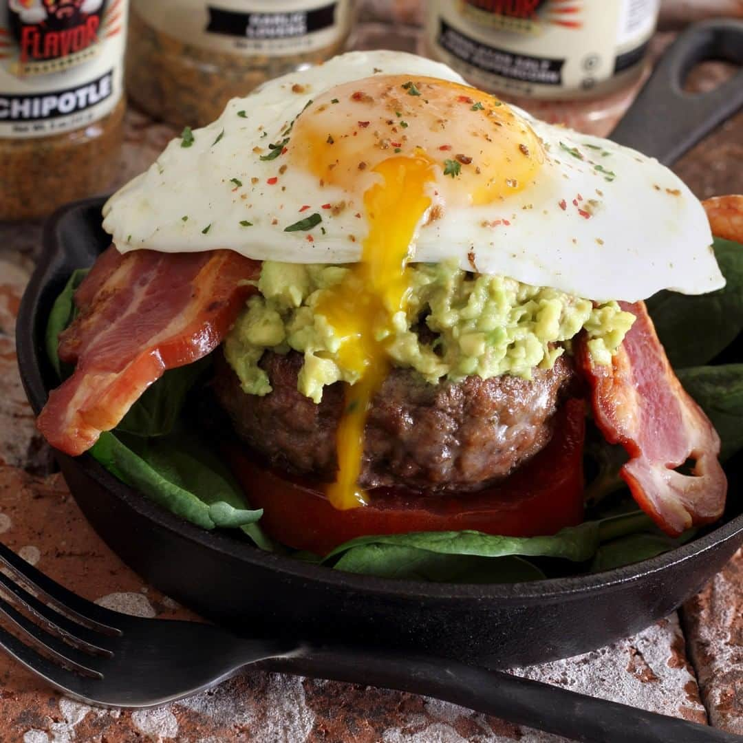 Flavorgod Seasoningsさんのインスタグラム写真 - (Flavorgod SeasoningsInstagram)「BREAKFAST BURGERS 🍔🍔🍔⁣ .⁣ A hearty breakfast for big appetites from @paleo_newbie_recipes. ⁣ Features @flavorgod Chipotle, Garlic Lovers and Himalayan Salt & Pink ⁣ Peppercorn seasonings. Plus @5280meat pork chorizo and bacon.⁣ .⁣ INGREDIENTS⁣ ⁣ 8 oz grass-fed ground beef⁣ 8 oz pork chorizo⁣ 4-6 slices of bacon⁣ 2-3 eggs⁣ 1 avocado, scooped out and mashed⁣ Large tomato, sliced⁣ @flavorgod Chipotle seasoning⁣ @flavorgod Garlic Lovers seasoning⁣ @flavorgod Himalayan Salt & Pink Peppercorn⁣ ⁣ INSTRUCTIONS⁣ ⁣ Cook bacon slices and set aside.⁣ ⁣ Gently combine ground beef and pork chorizo in a mixing bowl. Season as ⁣ desired with Flavor God Chipotle and Garlic Lovers seasonings.⁣ ⁣ Form 2-3 patties. Grill or pan fry until meat is cooked through.⁣ ⁣ Fry eggs and sprinkle with Flavor God Himalayan Salt & Pink Peppercorn.⁣ ⁣ Build up burgers starting with a light bed of spinach leaves and top ⁣ with egg.⁣」3月17日 22時00分 - flavorgod