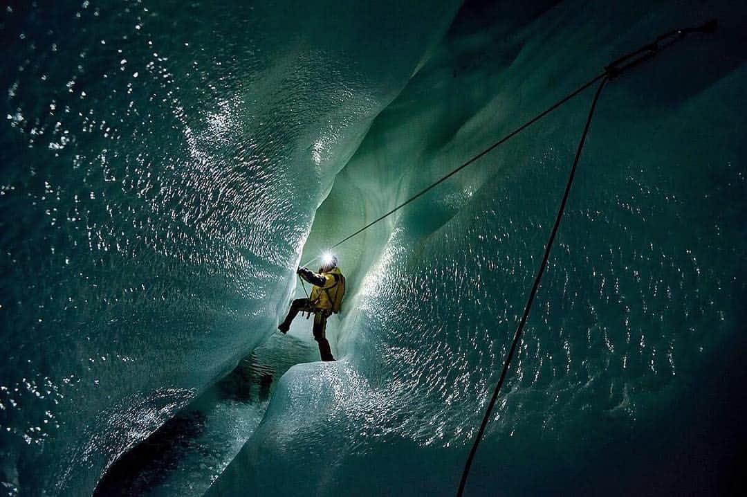thephotosocietyさんのインスタグラム写真 - (thephotosocietyInstagram)「Photo by @shonephoto (Robbie Shone) // An Italian explorer traverses through a canyon, avoiding deep cold water below a thin unstable crust of ice inside a moulin on the Gorner glacier, Switzerland. Progress is often slow when the floor is dangerously unstable like here. This was the first of many glacier caves we descended during our last expedition to the area.」3月18日 21時09分 - thephotosociety