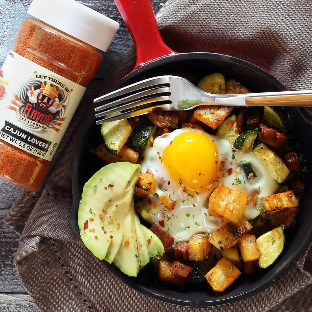 Flavorgod Seasoningsさんのインスタグラム写真 - (Flavorgod SeasoningsInstagram)「SPICY SAUSAGE & SWEET POTATO MINI-SKILLET 🥘🥘🥘⁣ .⁣ Here's a fun breakfast idea that finishes in the oven using cast-iron ⁣ mini-skillets. We used FLAVOR GOD CAJUN LOVERS Seasoning for a little ⁣ extra kick with ours. However, feel free to substitute with any other ⁣ FLAVOR GOD seasoning you'd prefer.⁣ #⁣ From @paleo_newbie_recipes:⁣ #⁣ INGREDIENTS⁣ 4 single-serve cast-iron skillets⁣ 2 pre-cooked sausages, sliced (we used Andouille)⁣ 1 sweet potato, peeled and diced small⁣ 1 zucchini, quartered and chopped⁣ 4 eggs⁣ 2 Tbsp olive oil⁣ FLAVOR GOD CAJUN LOVERS Seasoning, to taste⁣ #⁣ INSTRUCTIONS⁣ Preheat oven to 375ºF.⁣ --⁣ Start using a regular-sized stovetop skillet and sauté the diced sweet ⁣ potato in about 2 tablespoons of olive oil over medium heat. Season ⁣ while cooking as desired with FLAVOR GOD CAJUN LOVERS Seasoning, plus a ⁣ little salt and pepper. Cook potato until tender, about 10-12 minutes. ⁣ Next add the chopped zucchini and sausage to the same skillet, stir and ⁣ cook everything for another 2 minutes.⁣ --⁣ Divide into equal portions and transfer everything from the ⁣ regular-sized skillet into the four mini-skillets. Next crack an egg ⁣ directly over the contents of each mini-skillet. Place the mini-skillets ⁣ in your 375ºF oven and cook just until egg sets – around 9-12 minutes.⁣ --⁣ Carefully remove mini-skillets with oven mitt or towel, and enjoy!⁣ =====================」3月18日 22時00分 - flavorgod