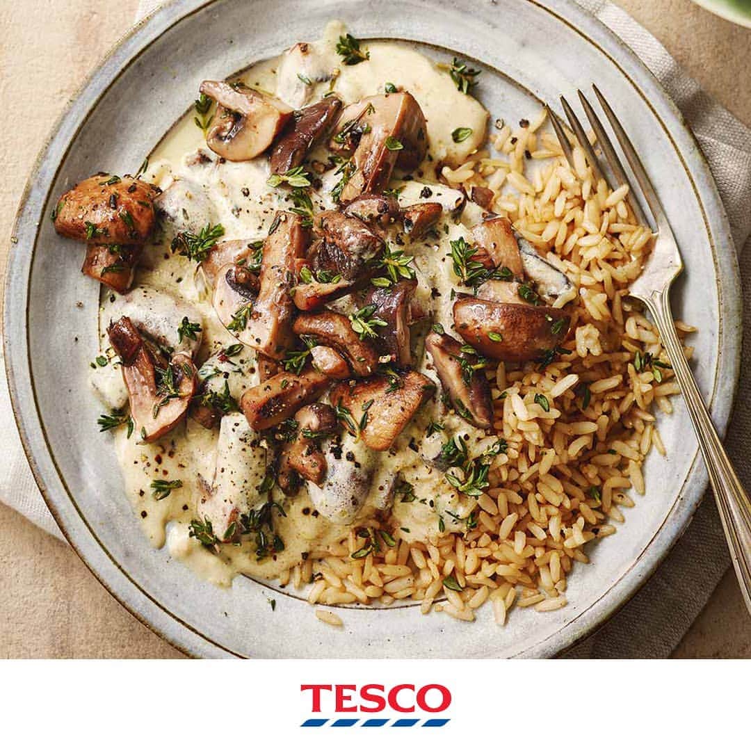 Tesco Food Officialさんのインスタグラム写真 - (Tesco Food OfficialInstagram)「The two most beautiful words in the English language... ‘stroganoff tonight?’ With big browned mushrooms and a fragrant 'oat fraîche' sauce, @DerekSarno has given classic strog a #PlantBased spin everyone can enjoy.⁣ ⁣ #MeatFreeMonday #Vegan⁣ ⁣ Ingredients⁣ 2 tbsp olive oil, plus 2 tsp⁣ 250g pack Tesco Finest forestière mushrooms, or chestnut mushrooms, quartered⁣ 125g pack Tesco Finest shiitake mushrooms, stems roughly chopped, caps thickly sliced⁣ 10g fresh thyme, leaves picked⁣ 1 onion, sliced into half-moons⁣ 4 garlic cloves, roughly chopped⁣ 1 vegetable stock pot, made up to 400ml⁣ 230ml unsweetened oat milk alternative, or any plant-based milk alternative⁣ 1 tbsp plain flour⁣ 120g Oatly creamy oat fraîche⁣ 1 tbsp soy sauce⁣ 1 tbsp Dijon mustard⁣ To serve⁣ 300g brown rice⁣ 360g pack curly kale, thick stalks discarded⁣ ⁣ Method⁣ 1. Heat 1 tbsp oil in a large, frying pan over medium-high heat. Add mushrooms in an even layer stirring occasionally for 8-10 mins until lightly browned. Add half the thyme leaves, season and cook for 30 secs. Transfer the mushrooms to a bowl; cover to keep warm and set aside.⁣ 2. Return the pan to the hob, reduce the heat to low and add 1 tbsp oil. Add onion and garlic and cook until softened. Add the stock, increase the heat to medium and simmer for 10 mins. Put the milk alternative and flour in a bowl and mix until smooth, then add to the pan. Simmer for 10 mins, stirring occasionally. Reduce the heat to low and stir in the oat fraîche, soy and mustard. Stir in three-quarters of the mushrooms. Remove from the heat and set aside.⁣ 3. Cook the rice and preheat the oven to gas 7, 220°C, fan 200°C. Arrange the kale on 2 baking trays and drizzle 1 tsp oil. Roast for 10 mins, toss, then roast for 5-10 mins.⁣ 4. Divide the rice between 4 bowls. Spoon over the sauce and top with the remaining mushrooms and thyme. Serve with the kale.」3月18日 22時10分 - tescofood