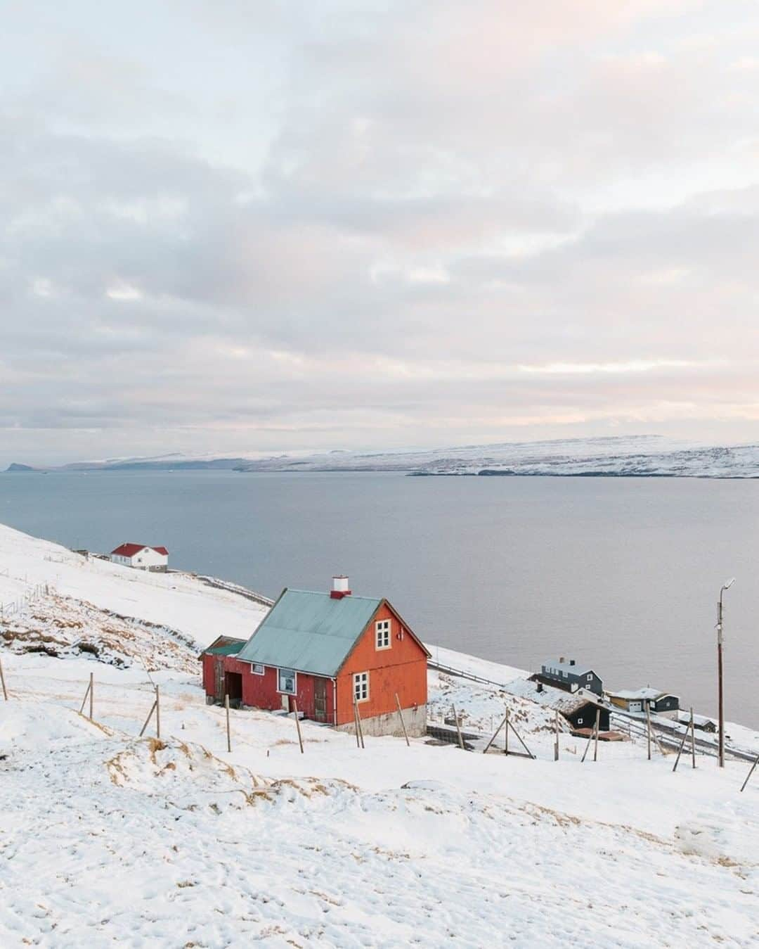 National Geographic Travelさんのインスタグラム写真 - (National Geographic TravelInstagram)「Photo by @kevinfaingnaert | For the intrepid traveler who’s prepared for ever-changing weather, the Faroe’s remote landscape of unspoiled moorlands, dramatic fjords, and bird-rich cliffs are rewarding, especially when it is covered with beautiful white snow. #faroeislands」3月19日 10時02分 - natgeotravel