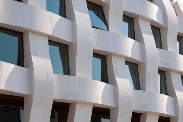 ウォントのインスタグラム：「'Argul Weave' in Bursa, Turkey is “a spectacle that both reflects the history and culture of the area." Designed by Burak Pekoglu, this structure boasts a bold weave-like aesthetic—a nod to the textile and weaving industry of Bursa. The construction & materials relied on the craftsmanship by local builders, who sourced and manually shaped each stone of the façade. This building is of great importance to facilitating a deeper connection amongst locals and their surroundings. — #WANTInspired #architecture #design #inspiration #craftmanship #traveltuesday」