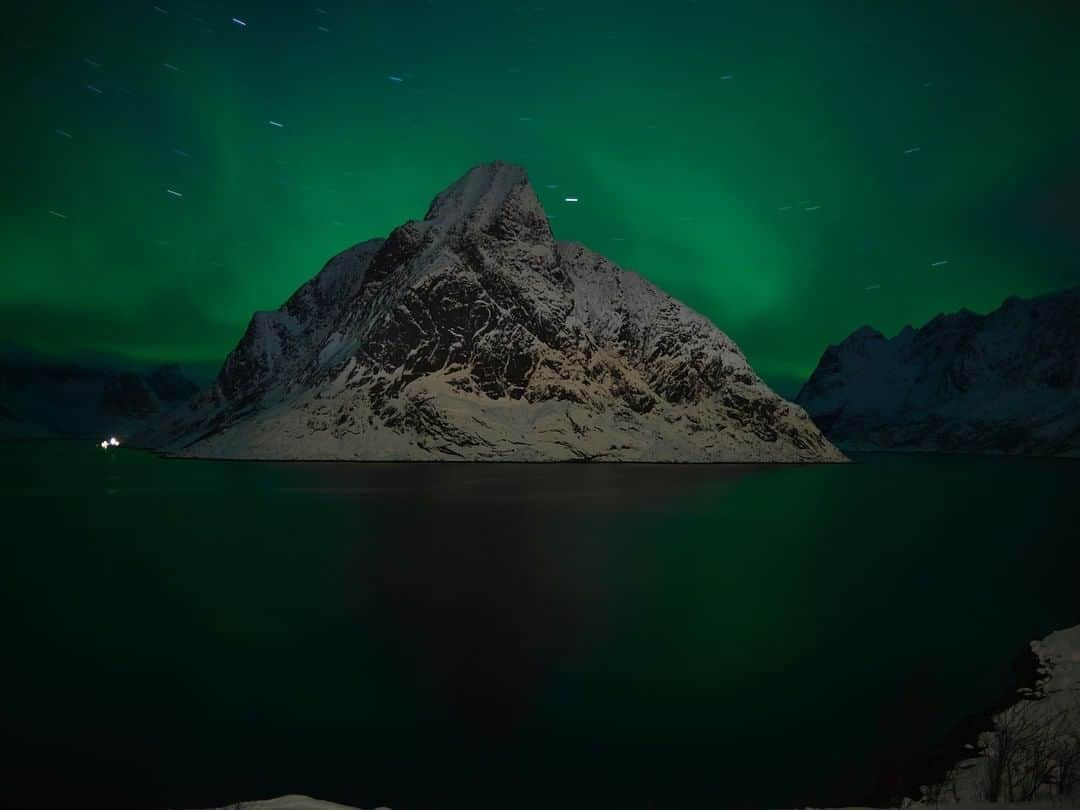 National Geographic Travelさんのインスタグラム写真 - (National Geographic TravelInstagram)「Photo by @simonnorfolkstudio I “God's Light Show. ”The aurora borealis illuminates Olstind Mountain in Reinefjord, Lofoten archipelago. Arctic Norway. The northern lights must have been as awe inspiring to the first settlers of the Lofoten archipelago 11,000 years ago as they are to any visitor today. It is 120 years since Norwegian Kristian Birkeland, the “father of modern auroral science,” suggested the theory that electrons from sunspots triggered auroras. Follow @simonnorfolkstudio for updates, outtakes, unpublished and archive material. @natgeo #simonnorfolk #norway #arctic #auroraborealis #northernlights #Lofoten #Reinefjord #olstind #aurorapolaris」3月20日 10時01分 - natgeotravel