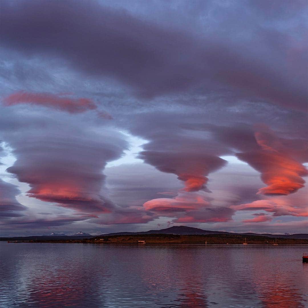 thephotosocietyさんのインスタグラム写真 - (thephotosocietyInstagram)「Photo by @salvarezphoto (Stephen Alvarez) | Puerto Natales, Chile: After three glorious days in the Patagonian Fjords I woke to this dramatic sunrise. Lenticular clouds like these are formed in the troposphere when the rivers of air rise above a surface obstruction. The successive turbulence causes large standing waves of moist air to form striated clouds. They are often the harbinger of rain or snow to come. True to form, the typical Patagonian rain started just 20 minutes after sunrise ended. Shot on assignment for @natgeotravel for more images like this from around the world follow me @salvarezphoto. #lenticular #patagonia」3月20日 21時48分 - thephotosociety