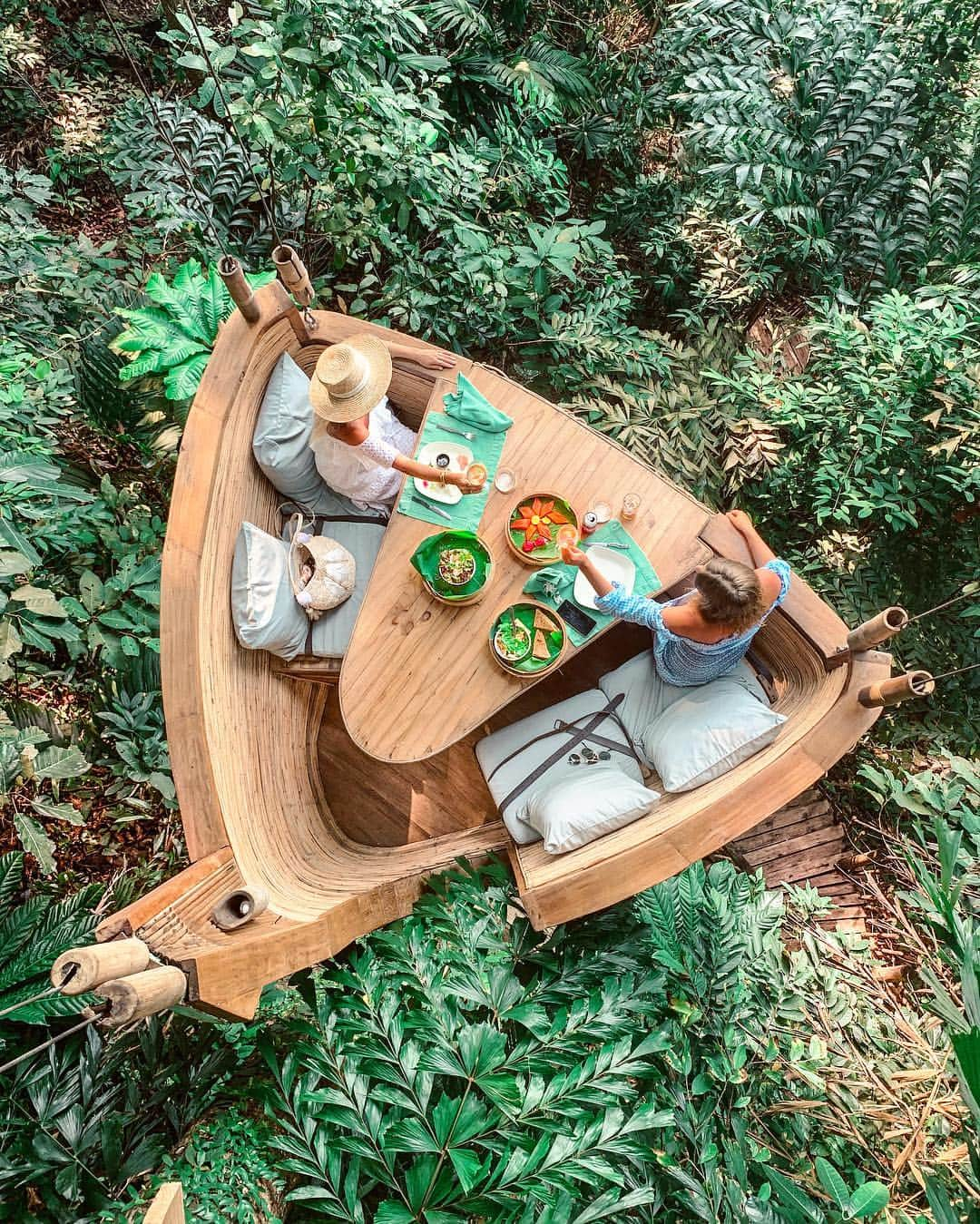 さんのインスタグラム写真 - (Instagram)「High tea in the treetops 🌴 where our waiter delivered our food and drinks via a zip line 😱 only at the amazing #SonevaKiri @discoversoneva . This was by far one of the most unique experiences I’ve had and the most fun 😀 and of course delicious because all the food here is incredible 🙏🏼 Lisa @seewantshop and I enjoyed a lovely high tea 🌿 a little rosé 🍷 spectacular ocean views 🌊 all while being suspended in this tree pod 🌳 a beautiful way to enjoy some quiet time in the jungle 🌴 . Thanks to our waiter for capturing this moment 🙏🏼 Swipe for the ocean view 🌊 . #treetops #treetopdining #hightea #discoversoneva #sonevaresorts #foodie #food #vegan #veganhightea #thailand #kohkood #jungle #thailandinsider #visitthailand #luxuryworldtraveler #hotelsandresorts #luxuryresort #sustainableresort #barefootluxury #luxurytravel #travelblogger #inthetrees #treetops #zipline #ziplining」3月21日 17時01分 - helen_jannesonbense