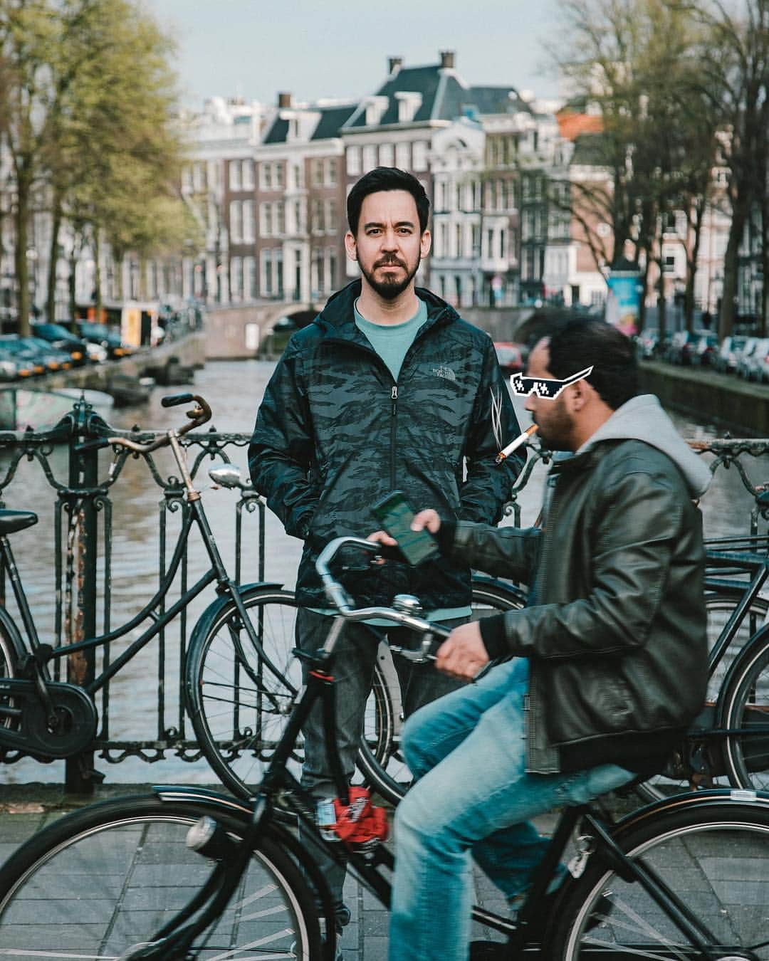 マイク・シノダさんのインスタグラム写真 - (マイク・シノダInstagram)「Amsterdam: don’t ride your bike, check your phone, wear 8 bit sunglasses, and smoke digital cigarettes at the same time. 🇳🇱 📱 💨 🚲 😎」3月22日 2時30分 - m_shinoda