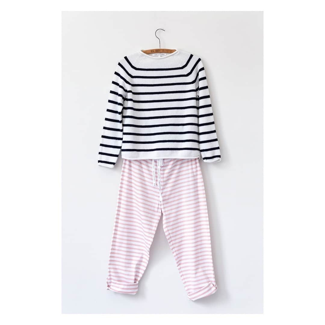 キャベジズ&ローゼズさんのインスタグラム写真 - (キャベジズ&ローゼズInstagram)「The uber-comfortable Terry Trousers are back just in time for Spring 💖 With delicate pink stripes on a white field made from 100% organic jersey. You will want to wear them everywhere with everything. They look particularly fetching with the newly arrived Freya Knit in Sage and the Sienna Sweater in Classic Navy 👇Tap to Shop Now👇#newarrivals #shopnewarrivals #organicclothing #organiccottonjersey #naturalfabrics #madeinscotland #knitwear #pinkstripes @christina_strutt @cabbagesandroses_shop」3月22日 7時26分 - cabbages_and_roses