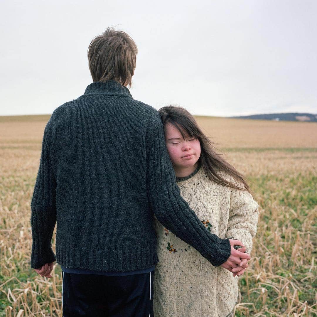 TIME Magazineさんのインスタグラム写真 - (TIME MagazineInstagram)「"Every picture shows a different side of her," writes @snezhana_von_buedingen about Sofie, a young German woman living with Down syndrome. "Sometimes, she is a child. Sometimes, she is a woman, longing for love. Sometimes she breaks from everything and is in her own world. She is a shy person, but at other times, she is very confident." When Sofie's relationship with Andy, her first experience of #love for someone she hadn‘t grown up with, ended, the breakup was not easily overcome. In many situations, the photographer adds, "Sofie is just like any other young woman—experiencing first loves and sorrows at or before age 19." Read more, and see more pictures, at the link in bio. Photographs by @snezhana_von_buedingen」3月22日 8時30分 - time