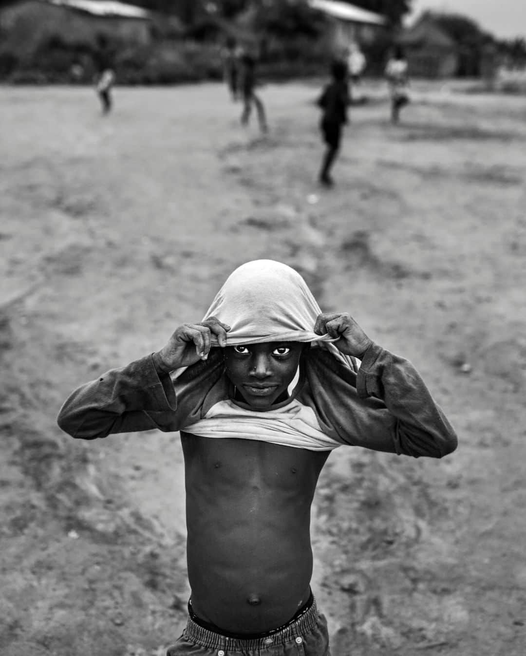 ナショナルジオグラフィックさんのインスタグラム写真 - (ナショナルジオグラフィックInstagram)「Photo by @michaelchristopherbrown | Children play football in the remote village of Obo, Central African Republic (CAR), located near the borders of South Sudan, to the east, and the Democratic Republic of the Congo, to the south. Africa’s pole of inaccessibility, one of the toughest places on the continent to reach, is also near Obo. In 2017, after the U.S. and Uganda concluded counter-LRA (Lord's Resistance Army) efforts and began withdrawing special-forces soldiers from the region, Obo and other southeastern CAR communities were left largely unprotected. Since then, armed groups have carried out attacks on these communities, often targeting people based on their religious or ethnic identity or their livelihood.」3月22日 19時02分 - natgeo