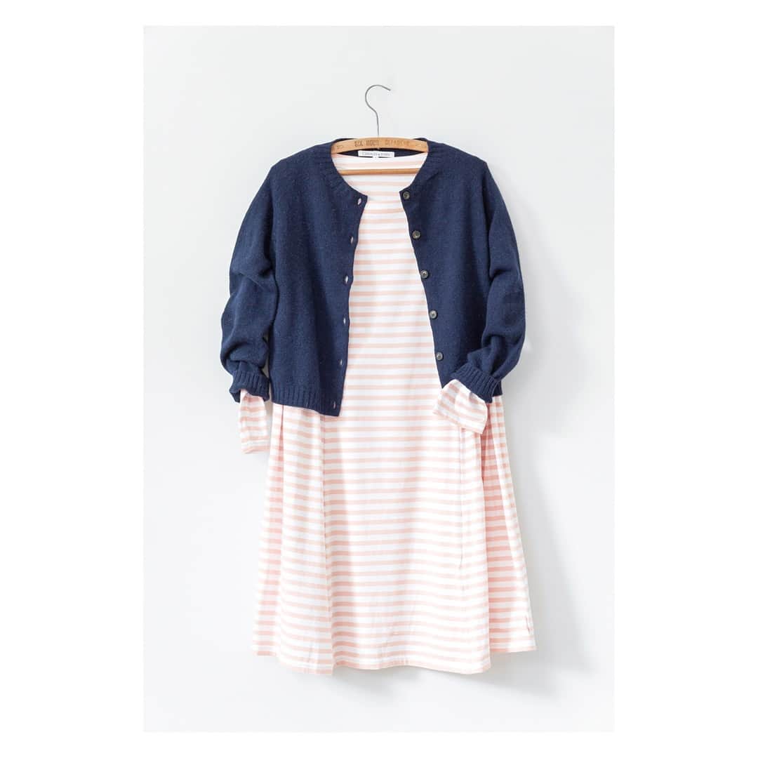 キャベジズ&ローゼズのインスタグラム：「A most wonderful combination of organic textiles and Scottish heritage knitwear ❤️ Tap to shop the Amelie Dress in Pink Stripe and the Navy Grace Cardigan #dresspink #stripedress #organicdresses #shopnewarrivals #organiccottonjersey #scottishknits #navycardigan #madeinscotland #cabbagesandroses #cabbagesandrosesfashion @christina_strutt @cabbagesandroses_shop」