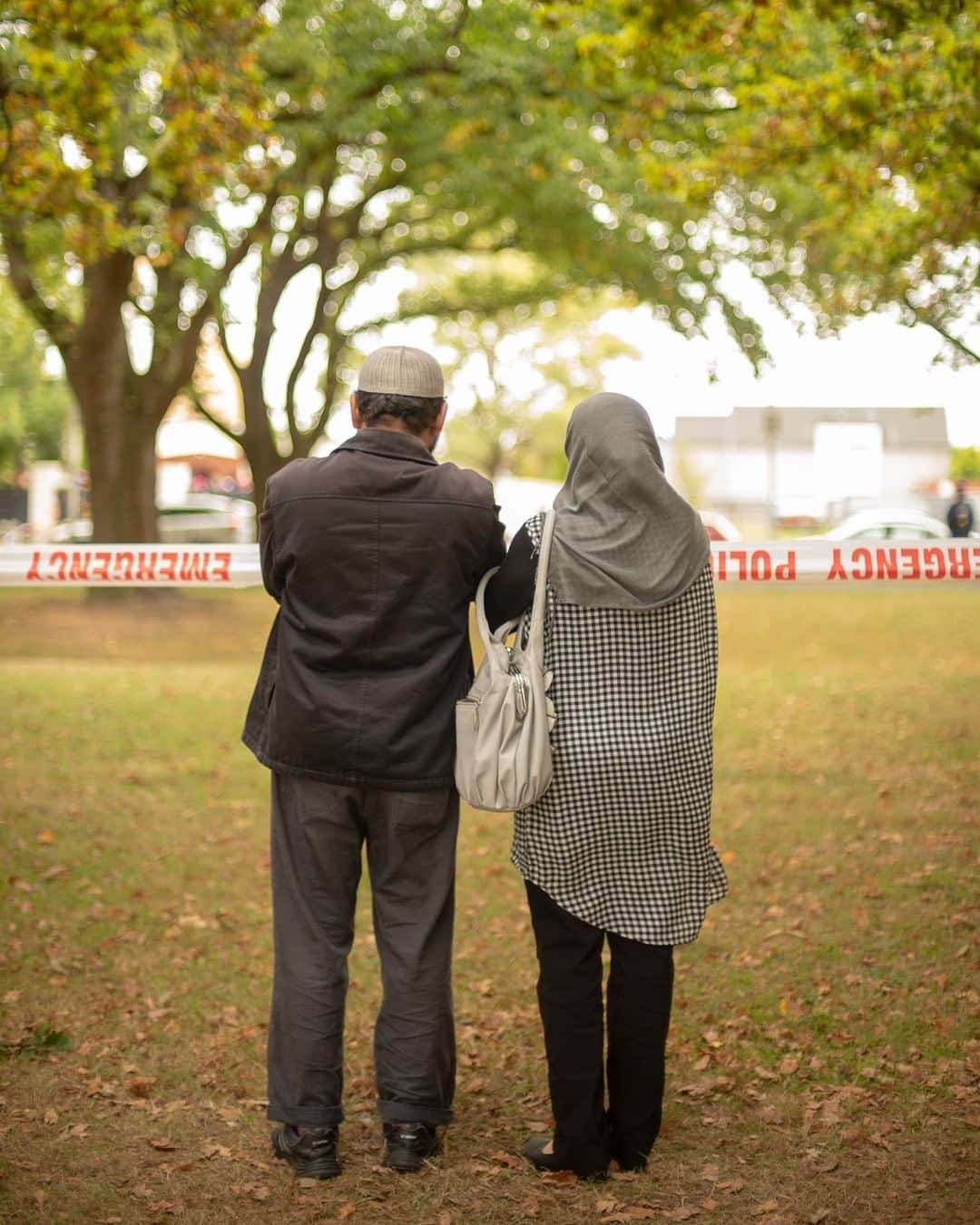 TIME Magazineさんのインスタグラム写真 - (TIME MagazineInstagram)「Muslim communities around the world are watching how #NewZealand responds with sympathy and also with gratitude in the wake of the terrorist attack in #Christchurch a week ago. New Zealand has taken the decision not to give the shooter the soapbox he so clearly craves. The Prime Minister has refused to utter his name, and reporting restrictions mean his picture has been banned from newspapers. “When you have a leader like @jacindaardern coming out and defending people under attack, that sends a strong message,” said Harun Khan, secretary general of the Muslim Council of Britain. “It’s demonstrated the complete opposite of what the terrorist wanted to achieve.” New Zealanders have instead chosen to focus on unity, writes @charliecamp6ell. Christians, Hindus, Jews, Buddhists and Sikhs offered food and support for survivors and victims’ families. At flower memorials, hipsters with dyed blue hair comforted women in hijabs. Christchurch Mayor Lianne Dalziel tells TIME that the Islamic greeting As-salaamu ‘alaikum, or “Peace be with you,” is “very much an expression of the peaceful city that we were and still are.” In this photograph on March 17, two mourners take a quiet moment at a memorial site in Hagley Park, near the Al Noor mosque that was attacked. Read more at the link in bio. Photograph by @virginiawoodsjack for TIME」3月23日 0時00分 - time