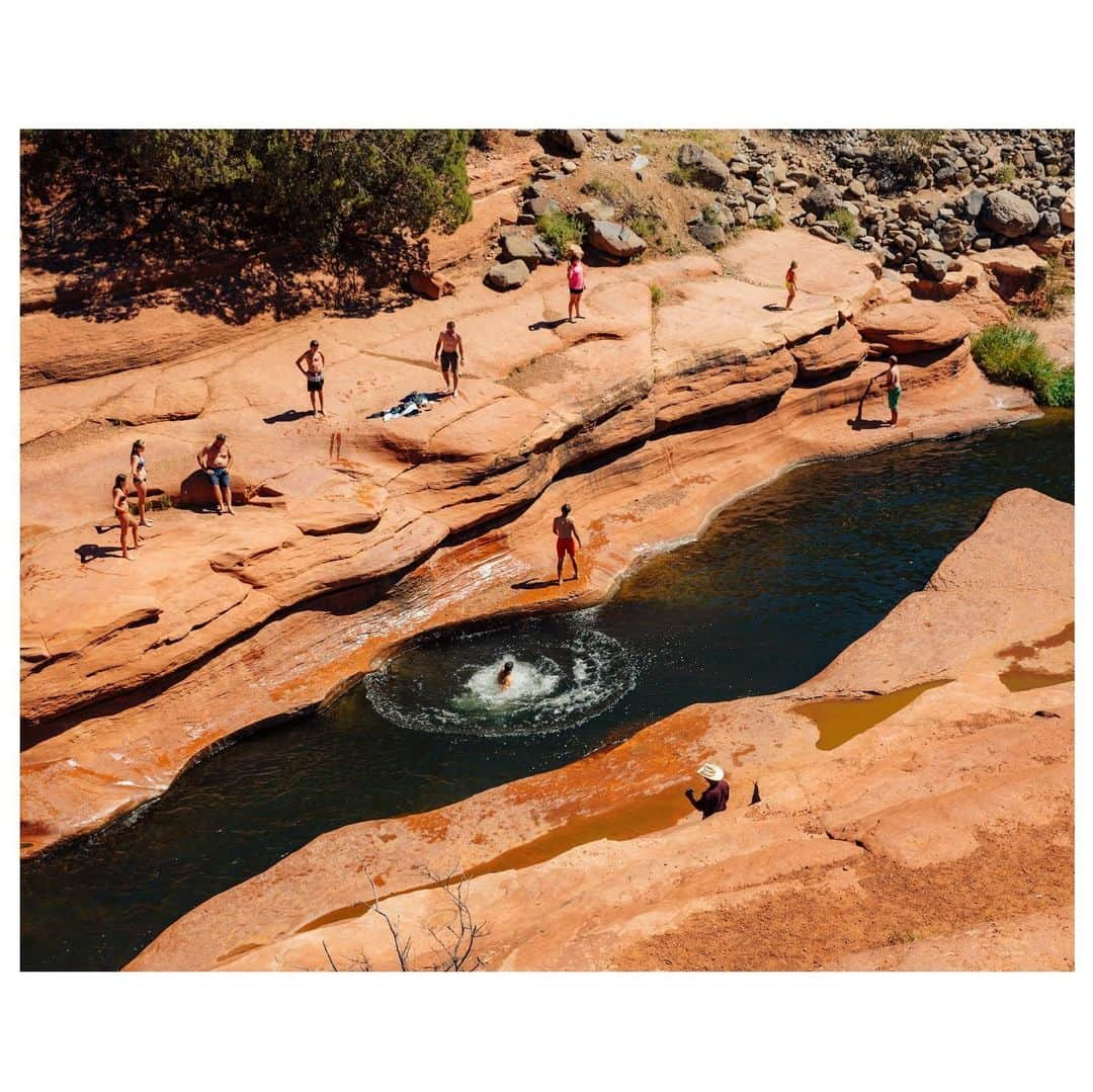 thephotosocietyさんのインスタグラム写真 - (thephotosocietyInstagram)「Photo by @MichaelGeorge // I first visited Slide Rock State Park during a cross-country bike trip in 2010. We’d heard rumors of a natural water slide and after cycling for 70 miles in Arizona heat that sounded like a mythical dream. Upon arrival, we were giddy with the sight of cliff jumpers and (of all things) an apple orchard? The area used to be a homestead apple farm. I should warn you that you also slide just walking around on the extremely slick rock. While taking these photos I watched at least 20 people crash and burn while simply trying to exist. I went back last year for @natgeotravel and while I didn’t get a chance to dive in, it was wonderful watching swimmers have a blast from above. // #sliderock #sliderockstatepark #sedona #arizona #sedonaarizona #natgeotravel #naturalwaterslide #waterslide」3月23日 9時48分 - thephotosociety