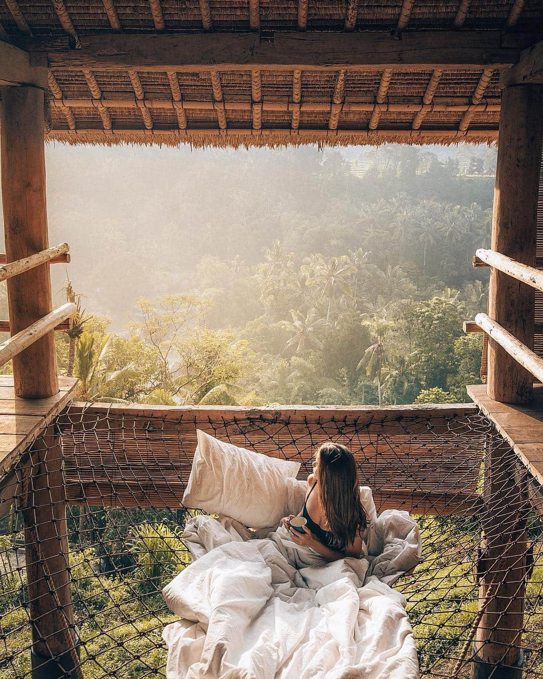 Airbnbさんのインスタグラム写真 - (AirbnbInstagram)「Wayan’s 150-year-old jungle hideaway might be one of the most serene places in the world to get stuck in a web. If you ever feel like getting unstuck, you can take a trail right down to the Ayung River for a dip near a waterfall—or take a whitewater rafting trip starting practically next door.  Photo: @lifewithelliott」3月24日 5時20分 - airbnb