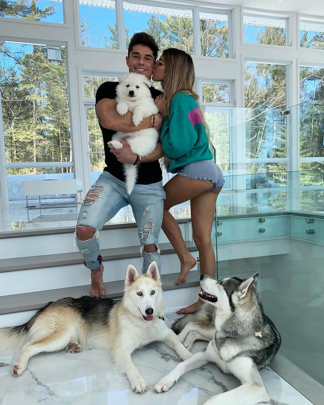 Elisabeth Riouxさんのインスタグラム写真 - (Elisabeth RiouxInstagram)「First family photo 🌙🐺 Today, we posted our announcement video, we have a new member in the wolfpack ❤️ I also really wanted you to learn more about what is the wolfpack for us and what it should be for you.. we keep calling our family the wolfpack and we always call each others “lou” 💭 in french “loup” means wolf (but we removed the “p” to be cool and different 🤷🏼‍♀️) we think a wolfpack is incredible, we are strong but together we are even stronger. The strength of the wolf is in the pack ⚡️ On my page, we all support each others, we love each others and lift each others up I love my community on my brands and on my personal page, you are all amazing and I want each and everyone of you to be Lou and be included in the wolfpack 🐺 we are just a beautiful family and we are stronger because of all the love and positivity we bring to this world 🌎 hope you guys are in for this wonderful adventure, we really wouldn’t be here with these babies in this house living this life without each and everyone of you and we are so grateful 🌈 on this note, here is our new puppy Maylie, she is the cutest samoyed ever and I am about to blow your instagram with puppy photos 🤪」3月25日 5時36分 - elisabethrioux