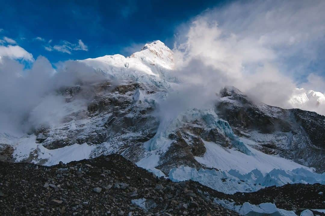 National Geographic Travelさんのインスタグラム写真 - (National Geographic TravelInstagram)「Photo by @max.lowe | Until you stand below the peaks of the Himalaya you don't truly understand what being midst the largest mountain range on earth is at its heart and scale. Here late afternoon light illuminates the peak of Nuptse as clouds tear from its icy flanks.」4月8日 16時02分 - natgeotravel