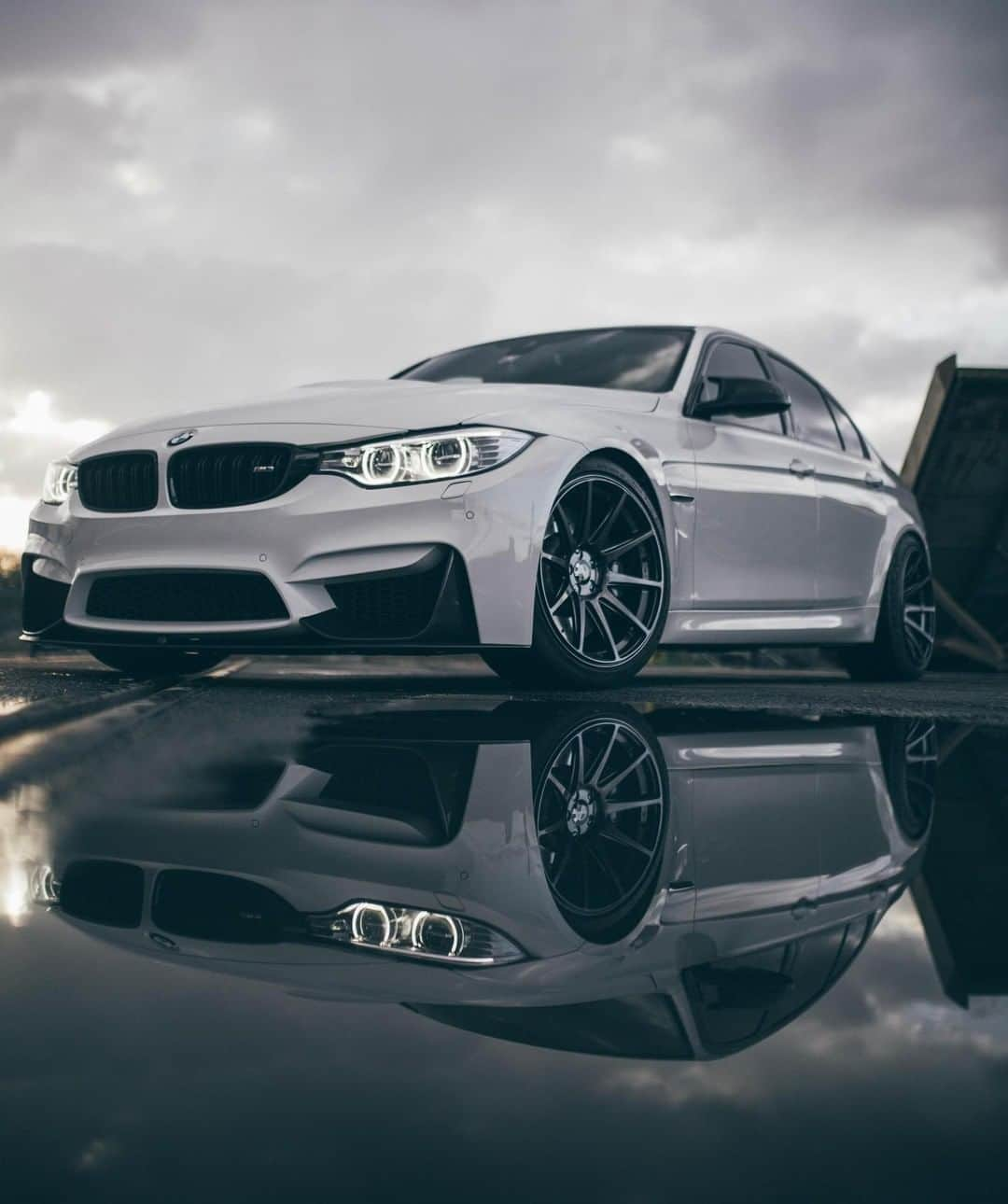 BMWさんのインスタグラム写真 - (BMWInstagram)「Mirror, mirror on the ground, who is the fairest of them all. #BMW #M3 #BMWRepost @visuals.by.oj @adel_hsc __ BMW M3 Sedan: Fuel consumption in l/100 km (combined): 8.8 (8.3). CO2 emissions in g/km (combined): 204 (194). The figures in brackets refer to the vehicle with seven-speed M double-clutch transmission with Drivelogic. The values of fuel consumptions, CO2 emissions and energy consumptions shown were determined according to the European Regulation (EC) 715/2007 in the version applicable at the time of type approval. The figures refer to a vehicle with basic configuration in Germany and the range shown considers optional equipment and the different size of wheels and tires available on the selected model. The values of the vehicles are already based on the new WLTP regulation and are translated back into NEDC-equivalent values in order to ensure the comparison between the vehicles. [With respect to these vehicles, for vehicle related taxes or other duties based (at least inter alia) on CO2-emissions the CO2 values may differ to the values stated here.] The CO2 efficiency specifications are determined according to Directive 1999/94/EC and the European Regulation in its current version applicable. The values shown are based on the fuel consumption, CO2 values and energy consumptions according to the NEDC cycle for the classification. For further information about the official fuel consumption and the specific CO2 emission of new passenger cars can be taken out of the „handbook of fuel consumption, the CO2 emission and power consumption of new passenger cars“, which is available at all selling points and at  http://www.dat.de/angebote/verlagsprodukte/leitfaden-kraftstoffverbrauch.html.」4月8日 17時00分 - bmw