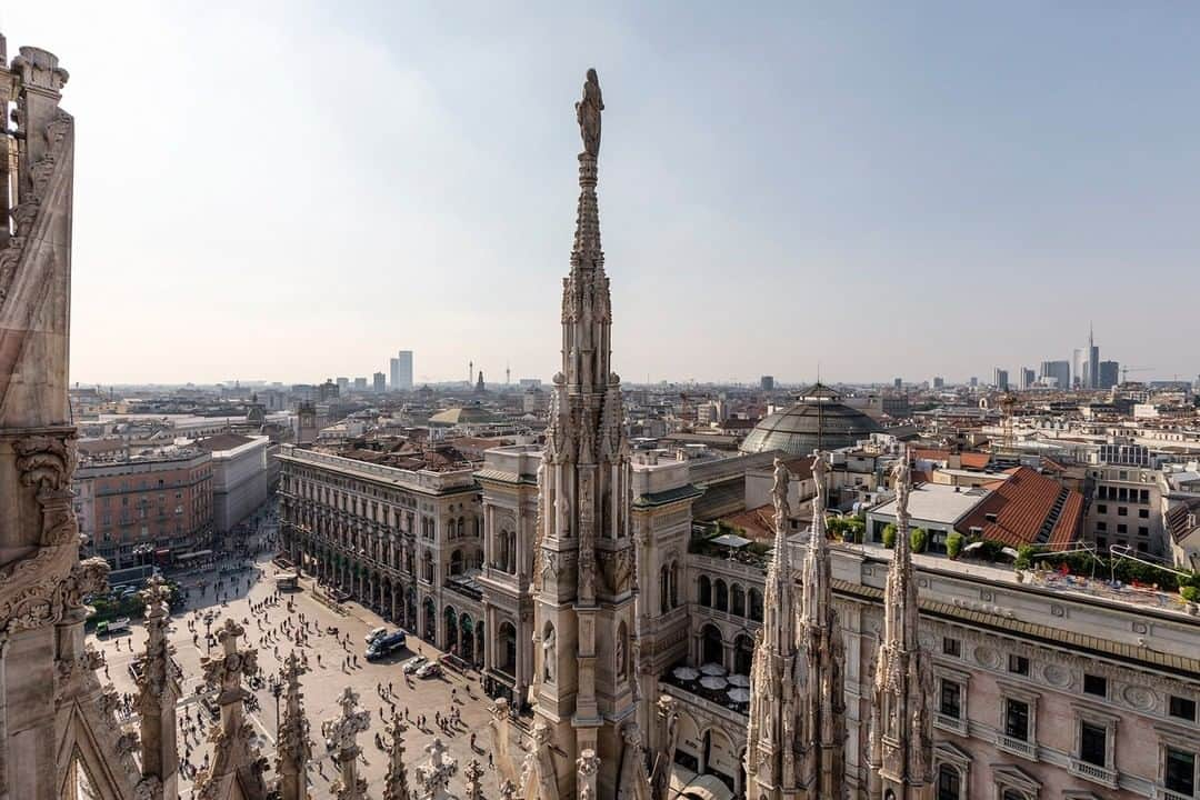 National Geographic Travelさんのインスタグラム写真 - (National Geographic TravelInstagram)「Photo by @andrea_frazzetta | Milan, Italy. A view of the city from the top of the Duomo cathedral terrace. The Piazza del Duomo (Cathedral Square) marks the center of Milan, both in a geographic sense and because of its importance from an artistic, cultural, and social point of view. The Duomo is Milan’s most iconic monument. A feat of Gothic architecture, its Italian marble facade, intricately carved windows, and lace-like ornamentation took five centuries to complete. To see more photos from my travels, follow me @andrea_frazzetta #italy #milan #duomo」3月26日 0時59分 - natgeotravel