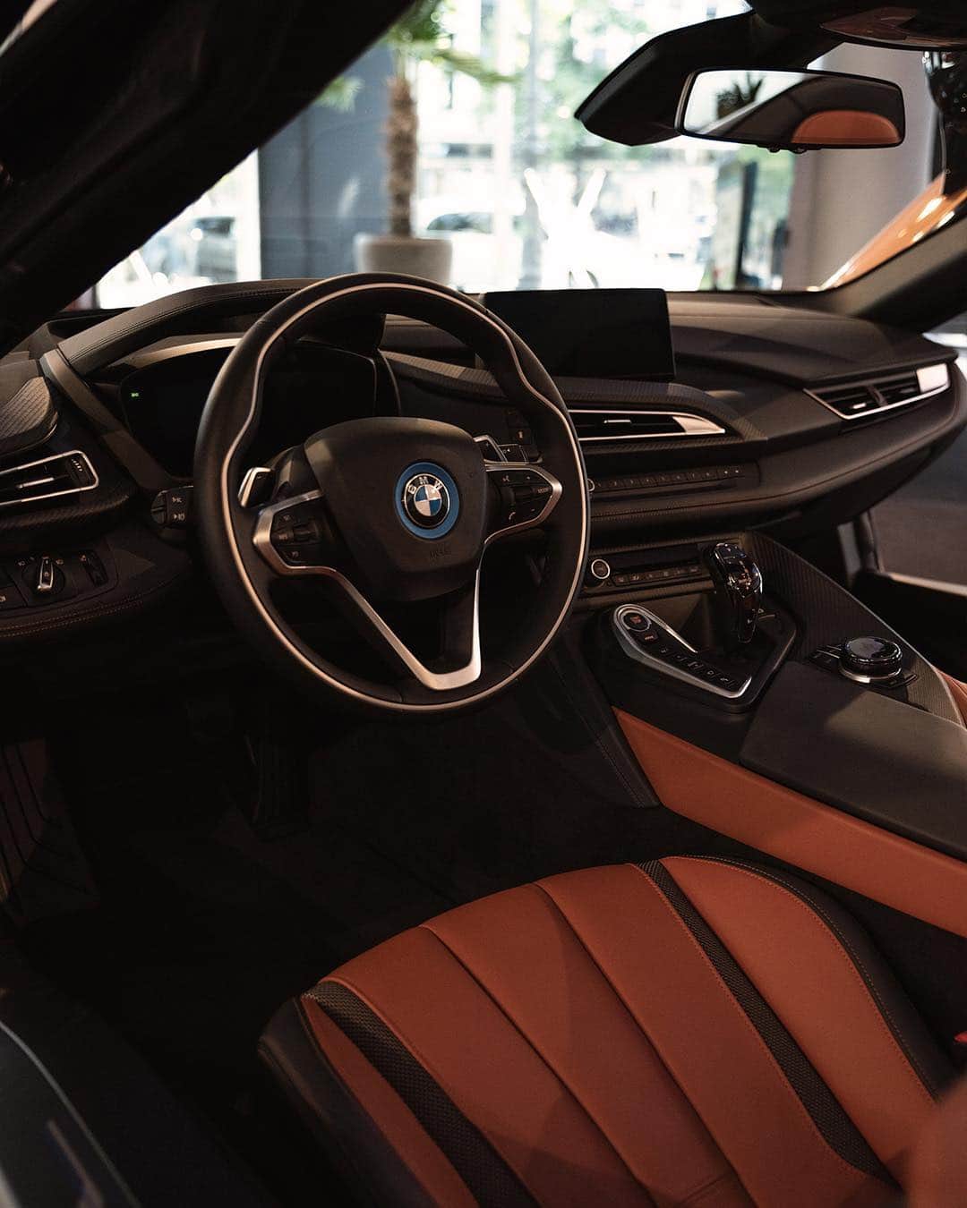 BMWのインスタグラム：「Come for the looks, stay for the feeling.  The BMW i8 Roadster. #BMWrepost @aytomotive  #BMW #i8 #BMWi __ BMW i8 Roadster: Energy consumption in kWh/100km (combined): 14.5 kWh. Fuel consumption in l/100 km (combined): 2.0. CO2 emissions in g/km (combined): 46 g/km. The values of fuel consumptions, CO2 emissions and energy consumptions shown were determined according to the European Regulation (EC) 715/2007 in the version applicable at the time of type approval. The figures refer to a vehicle with basic configuration in Germany and the range shown considers optional equipment and the different size of wheels and tires available on the selected model. The values of the vehicles are already based on the new WLTP regulation and are translated back into NEDC-equivalent values in order to ensure the comparison between the vehicles. [With respect to these vehicles, for vehicle related taxes or other duties based (at least inter alia) on CO2-emissions the CO2 values may differ to the values stated here.] The CO2 efficiency specifications are determined according to Directive 1999/94/EC and the European Regulation in its current version applicable. The values shown are based on the fuel consumption, CO2 values and energy consumptions according to the NEDC cycle for the classification. For further information about the official fuel consumption and the specific CO2 emission of new passenger cars can be taken out of the „handbook of fuel consumption, the CO2 emission and power consumption of new passenger cars“, which is available at all selling points and at https://www.dat.de/angebote/verlagsprodukte/leitfaden-kraftstoffverbrauch.html.」