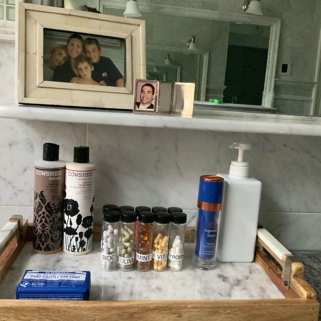 ボビー・ブラウンのインスタグラム：「Morning view from my top shelf. It’s true I organize my vitamins in visual glass vials from @thecontainerstore with a label maker with a @ptouchessentials  some of my new and old favs here @augustinusbader @sohohouse @drbronner and my boys」