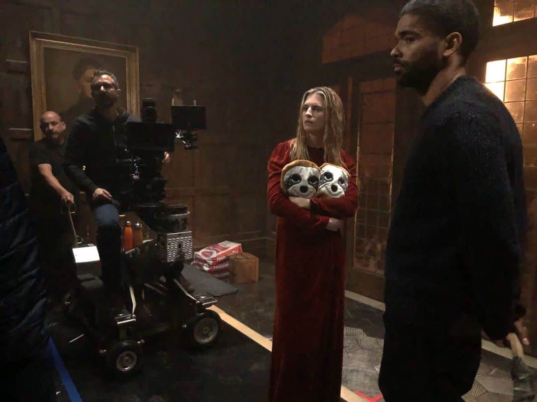 ブリット・マーリングのインスタグラム：「The sound stages where we shot part II #theoa were freezing cold and Kingsley (Karim) and I were often soaking wet so we passed these sloth baby hot water bottles back and forth to stay warm.  Kingsley let me hold his sloth baby most of the time because he’s a prince ☺️ That’s our incredible director of photography #stevenmeizler behind the camera and grip Kenny.」