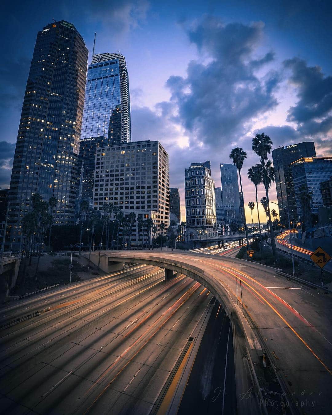 CANON USAさんのインスタグラム写真 - (CANON USAInstagram)「"Waited for a decent Downtown LA sunset with the captivating skyscrapers alongside the busy freeway. Love capturing moments in this busy city." #MyCanonStory  Photo Credit: @josephjurado Camera: #Canon EOS 5D Mark III Lens: EF 24-105mm f/4L IS USM Aperture: f/8 ISO: 50 Shutter Speed: 20 sec Focal Length: 24mm」3月26日 22時45分 - canonusa