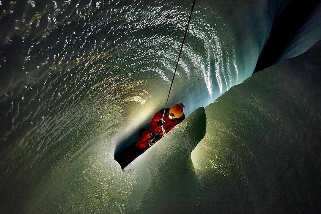 thephotosocietyさんのインスタグラム写真 - (thephotosocietyInstagram)「Photo by Robbie Shone @shonephoto | Deep inside the Gorner glacier, Switzerland, a member of our team of Italian explorers ascends a rope in a narrow slot through the beautifully sculptured ice. As a result of the movement of the glacier such moulins don't exist for long, it is therefore important to carry out thorough documentation as next year this cave will be gone.」3月26日 23時43分 - thephotosociety