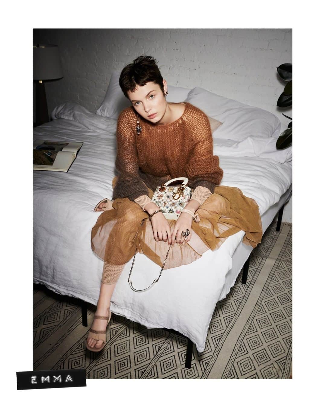 クリスチャンディオールさんのインスタグラム写真 - (クリスチャンディオールInstagram)「Even if you're just lounging around at home, the mini #LadyDior shines bright. Shot by @Pamela_Hanson for #DiorMagazine No.26, model @EmmaKateBoyd wears a degrade mohair sweater and faded pink tulle skirt from the Dior Spring-Summer 2019 collection by #MariaGraziaChiuri.⁣ #DiorSS19⁣」3月27日 0時00分 - dior