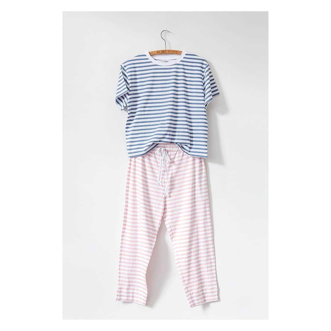キャベジズ&ローゼズのインスタグラム：「Dream in colour ❤ Stripes on stripes look wonderful with a little contrast. Wear the Terrance t-shirt in blue stripe organic cotton with the Terry Trousers in pink stripe organic cotton and stand out from the crowd #stripeshirt #stripe #stripestyle #springootd #comfortdressing #organicclothes #slowfashion #organiccotton #cabbagesandroses #cabbagesandrosesfashion @christina_strutt @cabbagesandroses_shop 👆Link In Bio👆」