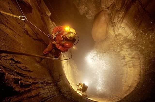 ナショナルジオグラフィックさんのインスタグラム写真 - (ナショナルジオグラフィックInstagram)「Photo by Stephen Alvarez @salvarezphoto | Mystery Falls Cave, Tennessee. Sometimes you can't make the photo you set out to shoot. I went down 281 feet in Mystery Falls Cave, hoping to shoot an image of the entire shaft from the bottom, but days of rain had swollen the waterfall to torrential levels. Instead of soaking myself and my team, I changed plans and shot straight down the shaft, as Kent Ballew climbed up the ropes he had rigged for me. The image is not a bad consolation prize! We went back weeks later when the water had receded and made the photo I had in mind. #explore #cave」3月27日 10時01分 - natgeo