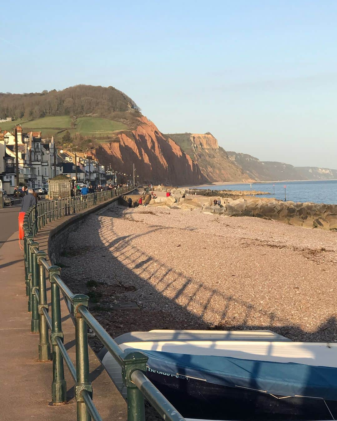 ブライアン・メイさんのインスタグラム写真 - (ブライアン・メイInstagram)「The lovely Victorian town of Sidmouth in Devon.  I always feel grateful to be back here for a moment. Fond memories of childhood holidays with my Mum and Dad.  And I don’t think this giant pain in my heart was there in those days. These days we come here - as Save-Me - to continue the battle to eradicate the mycobacterium Mbovis from cattle and wildlife.  It’s bitterly frustrating now to know that we have the solution in front of us, yet we cannot yet swing Government policy around to employ it.  However we are thankful that two top DEFRA officials will be joining us at the farm today. Things are changing - now there is an open dialogue between all points of view, with a genuine will to break through to victory over Bovine TB.  We’re grateful.  And ... some day ... all this will be history - viewed from a humane and #TBfree future world. Bri. 💥💥💥 Oh - and swipe for stereo view - a rather unsatisfactory stereo - but hopefully you’ll get the gist ...! That’s Salcombe Hill above the red sandstone headland - where sits the famous Norman Lockyer Observatory. I hope to be visiting again soon.」3月27日 10時23分 - brianmayforreal