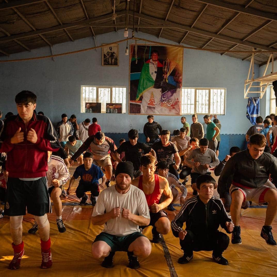 ニューヨーク・タイムズさんのインスタグラム写真 - (ニューヨーク・タイムズInstagram)「An ISIS bomber wrecked the Maiwand Wrestling Club in Kabul, Afghanistan, last September, killing dozens. Now the wrestlers have taken their revenge: They’ve rebuilt the gym and made it bigger, better and even busier than before. 2 former wrestlers — Paul Halsey, from Ridgefield, Connecticut, and Hooman Tavakolian, an Iranian-American investment manager in New York and London — came to the club’s rescue after reading our coverage by gathering @gofundme donations and support. Wrestling teams at universities like @pennstate and @uiowa kicked in; so did @nike, @adidas and @cliffkeenathletic. In all, they raised more than $10,000, Hooman said, which, along with donated gear, was enough to rebuild. Our #wrestlers “believe we need to show the terrorists that they can kill us, but they can’t stop us,” said Maalim Abbas, Maiwand’s head coach. @kianahayeri shot this photo. Visit the link in our profile to read more from #nytimes reporter Fatima Faizi. #🤼‍♂️」3月28日 4時26分 - nytimes