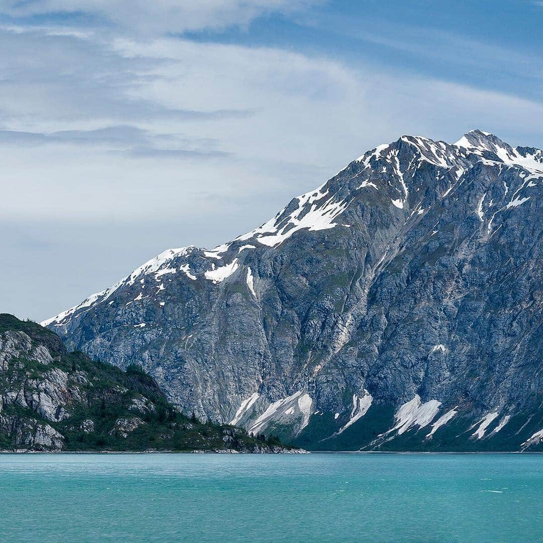 National Geographic Travelさんのインスタグラム写真 - (National Geographic TravelInstagram)「Photo @stephen_matera | (swipe to see the full image) Composite Island in front of 5,083' Mount Merriam on a sunny day, Glacier Bay National Park and Preserve, Alaska. At the end of the Little Ice Age in the mid 1700s, Glacier Bay was completely covered by a large tidewater glacier. By the time John Muir explored Glacier Bay in the 1879, the glacier had receded 40 miles. Follow me @stephen_matera for more images like this from Alaska and around the world. #SEAlaska #wilderness」3月29日 1時45分 - natgeotravel