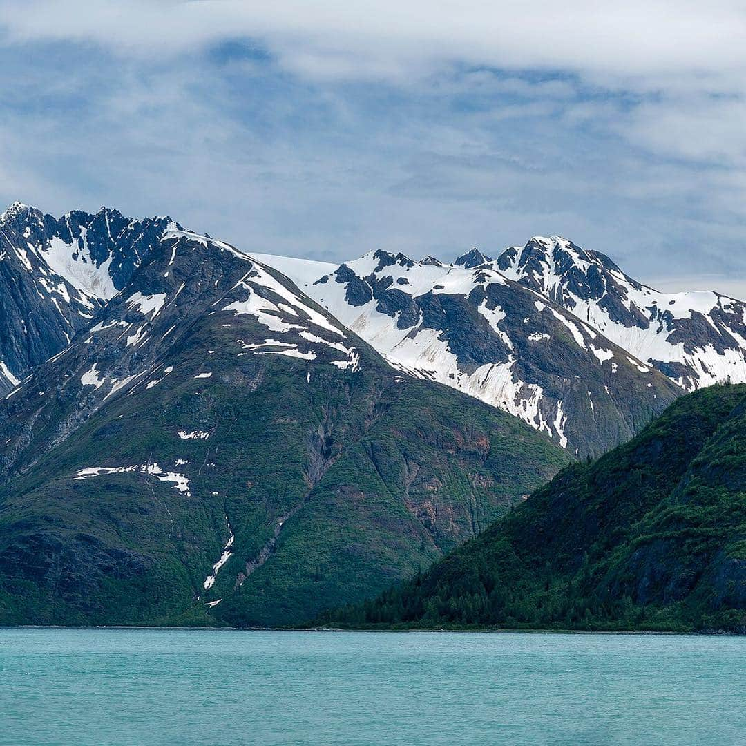 National Geographic Travelさんのインスタグラム写真 - (National Geographic TravelInstagram)「Photo @stephen_matera | (swipe to see the full image) Composite Island in front of 5,083' Mount Merriam on a sunny day, Glacier Bay National Park and Preserve, Alaska. At the end of the Little Ice Age in the mid 1700s, Glacier Bay was completely covered by a large tidewater glacier. By the time John Muir explored Glacier Bay in the 1879, the glacier had receded 40 miles. Follow me @stephen_matera for more images like this from Alaska and around the world. #SEAlaska #wilderness」3月29日 1時45分 - natgeotravel