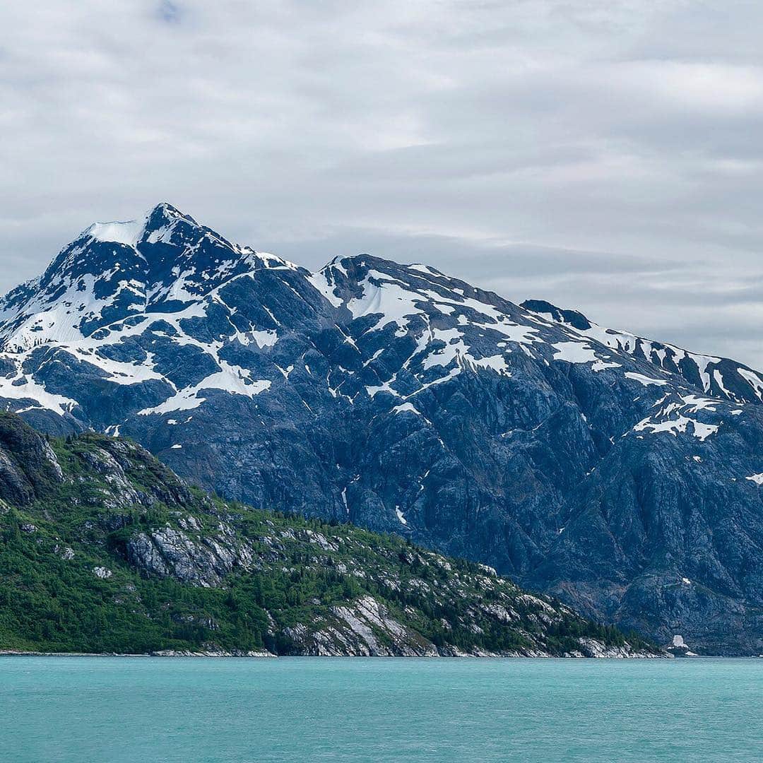 National Geographic Travelさんのインスタグラム写真 - (National Geographic TravelInstagram)「Photo @stephen_matera | (swipe to see the full image) Composite Island in front of 5,083' Mount Merriam on a sunny day, Glacier Bay National Park and Preserve, Alaska. At the end of the Little Ice Age in the mid 1700s, Glacier Bay was completely covered by a large tidewater glacier. By the time John Muir explored Glacier Bay in the 1879, the glacier had receded 40 miles. Follow me @stephen_matera for more images like this from Alaska and around the world. #SEAlaska #wilderness」3月29日 1時45分 - natgeotravel