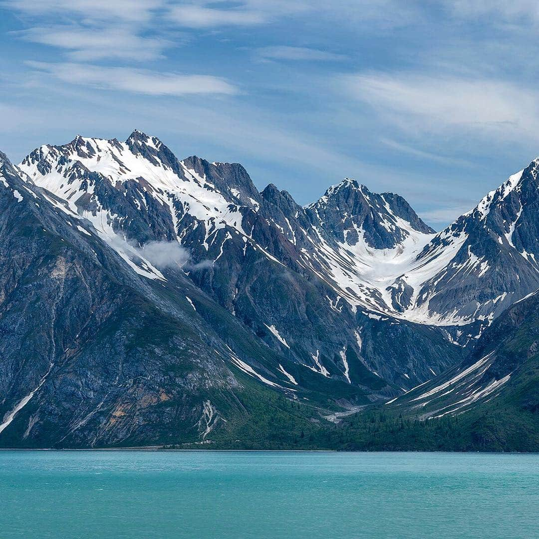 National Geographic Travelさんのインスタグラム写真 - (National Geographic TravelInstagram)「Photo @stephen_matera | (swipe to see the full image) Composite Island in front of 5,083' Mount Merriam on a sunny day, Glacier Bay National Park and Preserve, Alaska. At the end of the Little Ice Age in the mid 1700s, Glacier Bay was completely covered by a large tidewater glacier. By the time John Muir explored Glacier Bay in the 1879, the glacier had receded 40 miles. Follow me @stephen_matera for more images like this from Alaska and around the world. #SEAlaska #wilderness」3月29日 1時45分 - natgeotravel