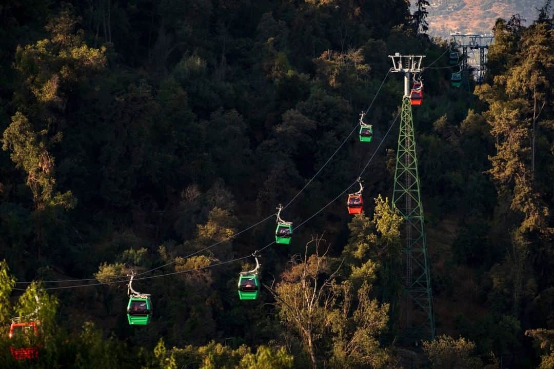 National Geographic Travelさんのインスタグラム写真 - (National Geographic TravelInstagram)「Photo by @KristaRossow | Bright red and green funicular cars ferry visitors across Parque Metropolitano in Santiago, Chile. This park on top of Cerro San Cristóbal covers 722 hectares and is the largest green space in the city. For more images from South America, follow me @KristaRossow. #Chile #Santiago」3月29日 16時01分 - natgeotravel