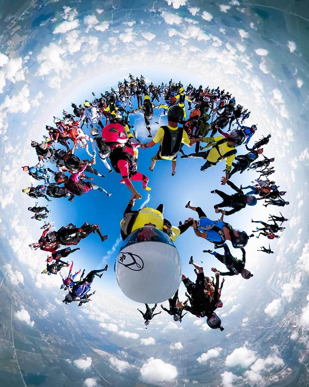 goproさんのインスタグラム写真 - (goproInstagram)「Photo of the Day: Drop us a pin. Exclusive meetings in exclusive places with #GoProFamily member @jennsen + #GoProFusion. • Spice up your feed with these tiny planets. Take $200 off #GoProFusion with TradeUp today. Link in bio. • • • #GoPro #Skydiving #GroupPhoto #Skydivegram」3月30日 1時20分 - gopro
